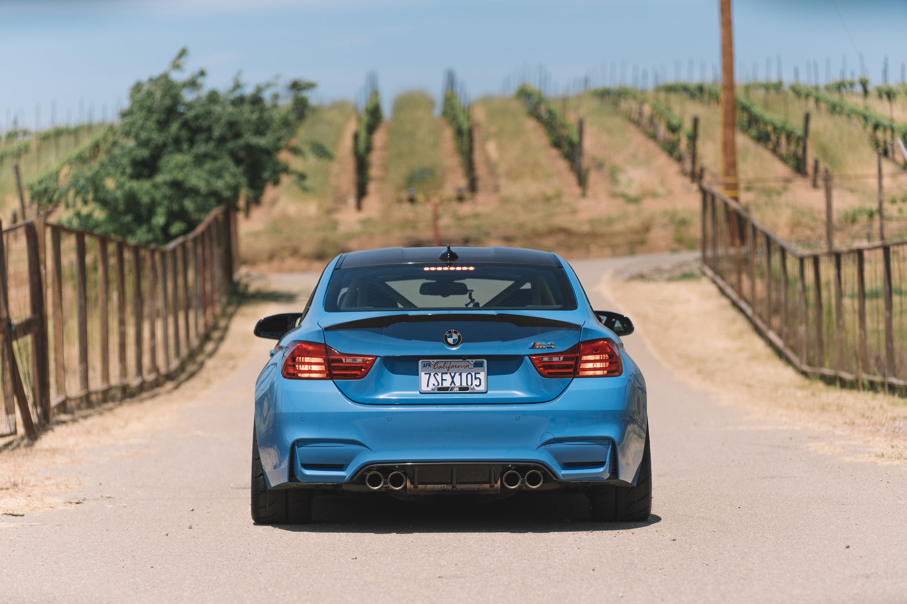 Blue BMW F82 Coupe M4 with 18" ARC-8R Apex wheels in Brushed Clear