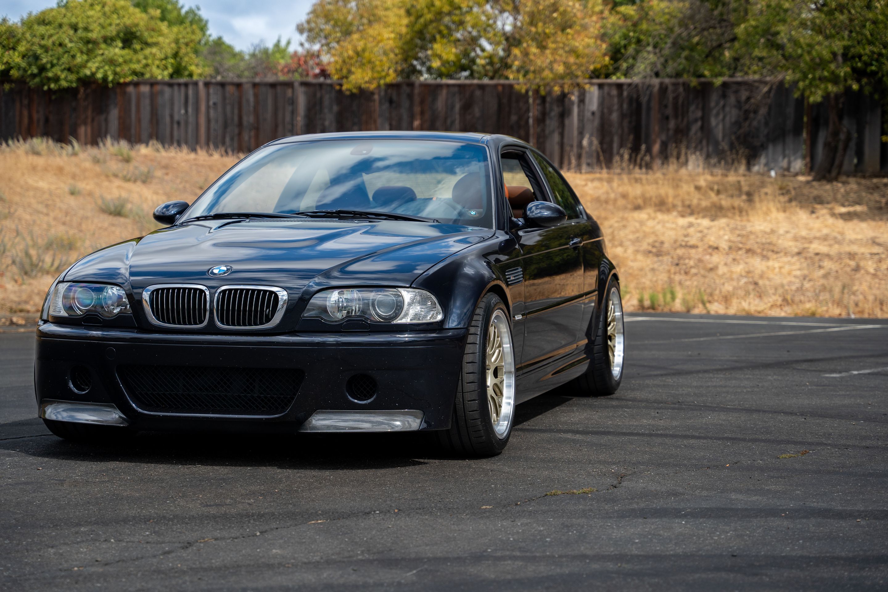 Black BMW E46 M3 with 18" ML-10RT Apex wheels in Machined Lip Gloss Motorsport Gold