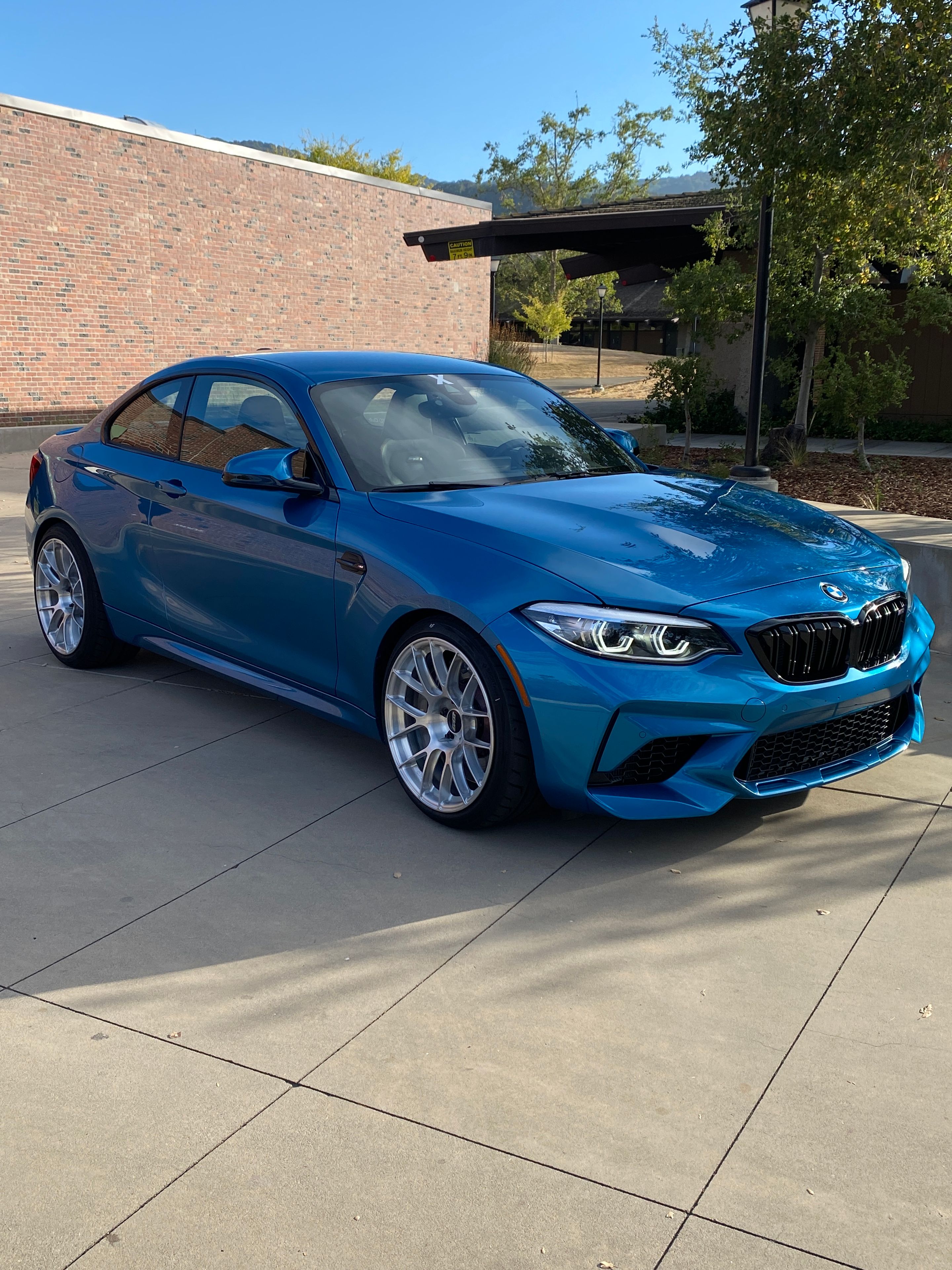 Blue BMW F87 M2 with 19" EC-7RS Apex wheels in Brushed Clear