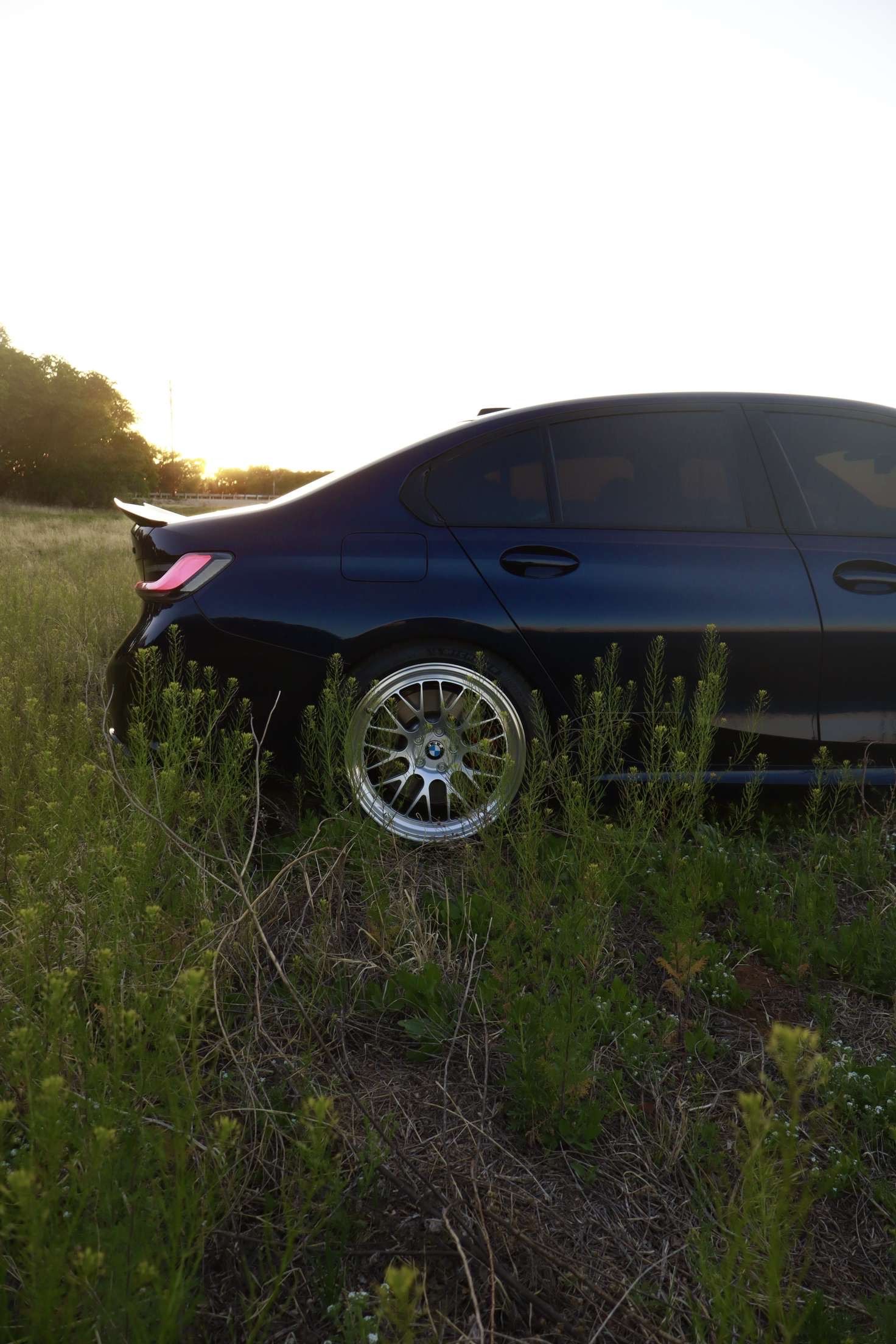 Black BMW G20 Sedan 3 Series with 19" ML-10RT Apex wheels in Machined Lip Race Silver