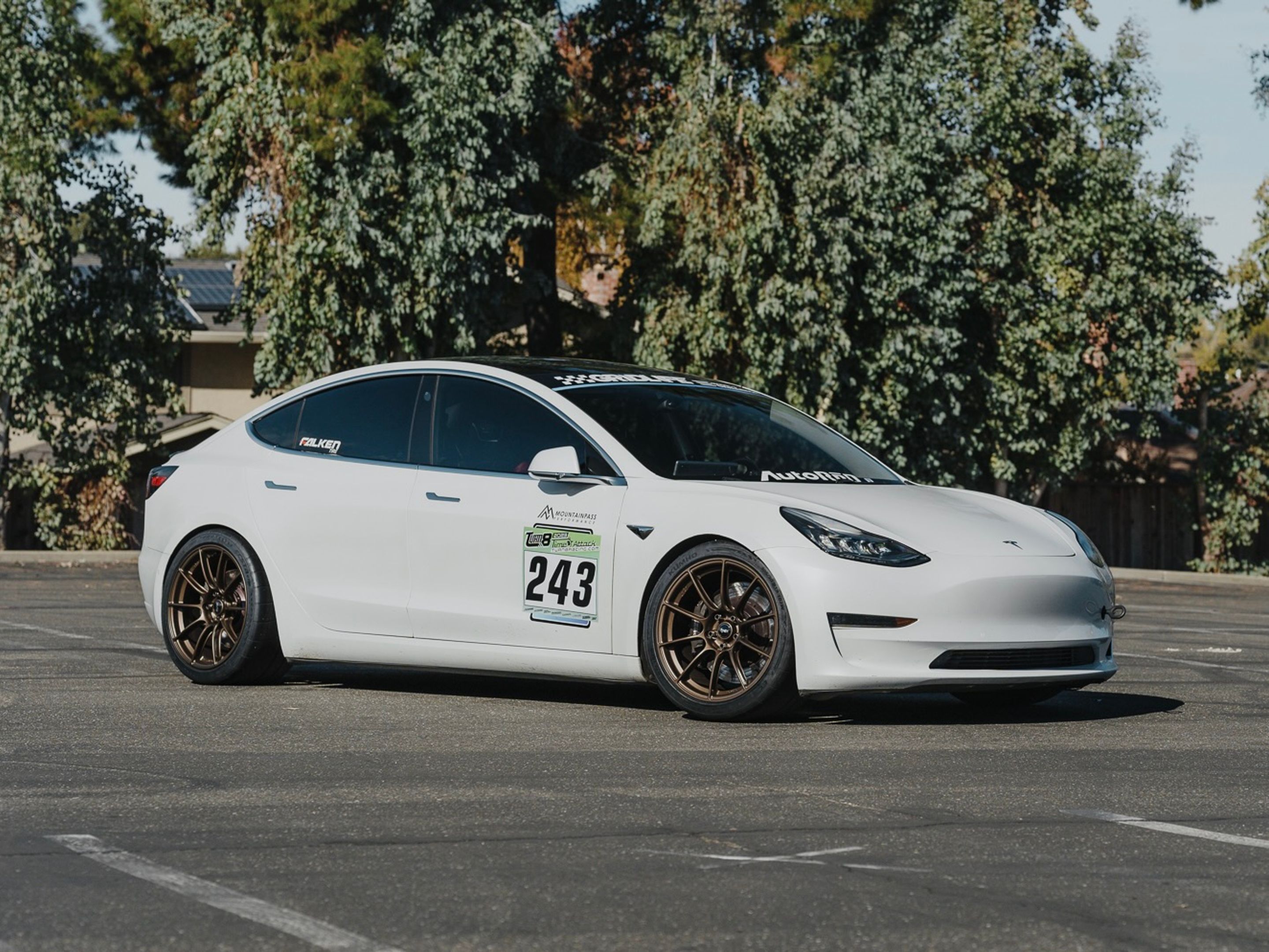 White Tesla Model 3 with 19" SM-10RS Apex wheels in Satin Bronze