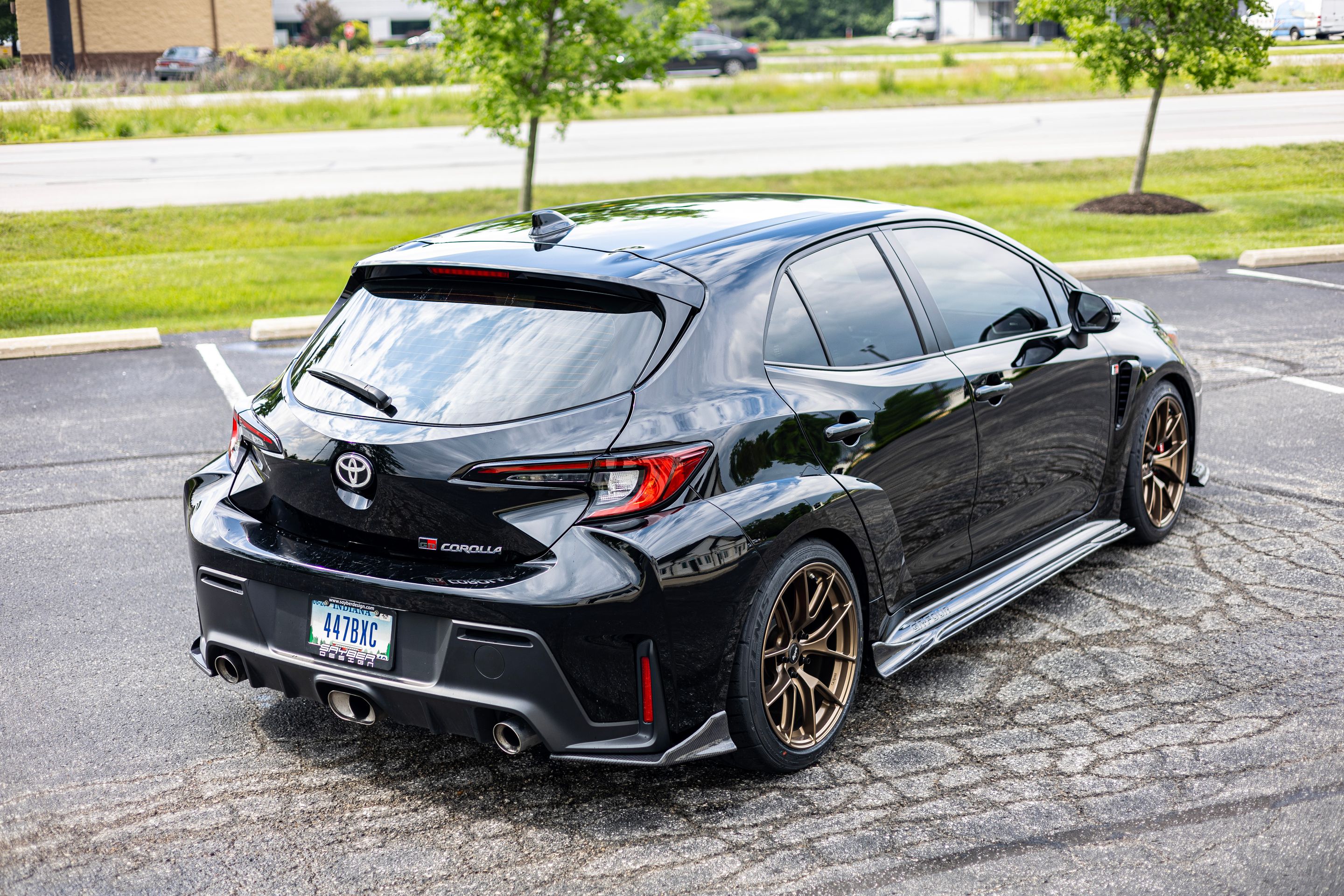 Black Toyota GR Corolla with 18" VS-5RS Apex wheels in Satin Bronze