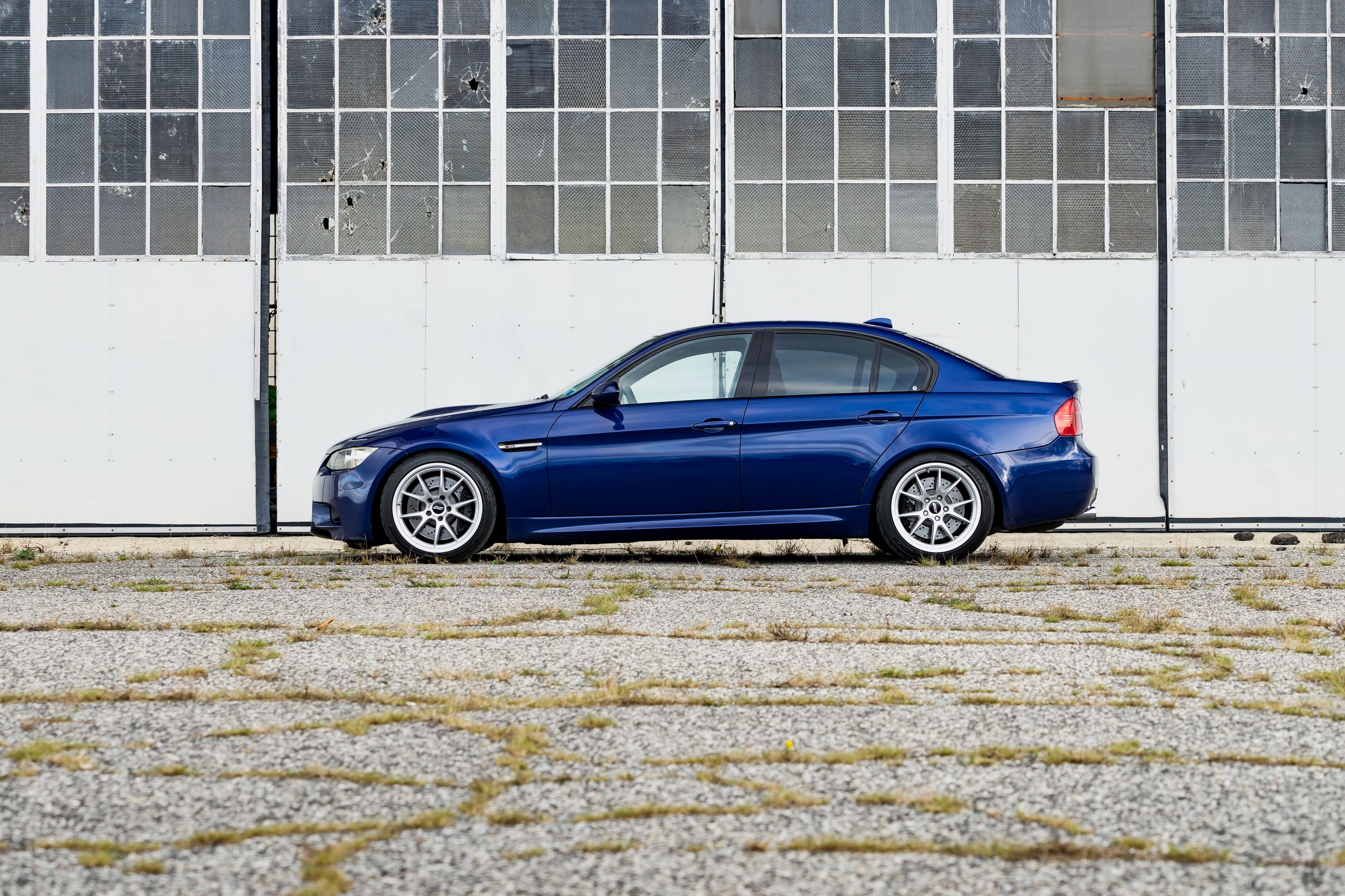 Blue BMW E90 Sedan M3 with 18" FL-5 Apex wheels in Race Silver
