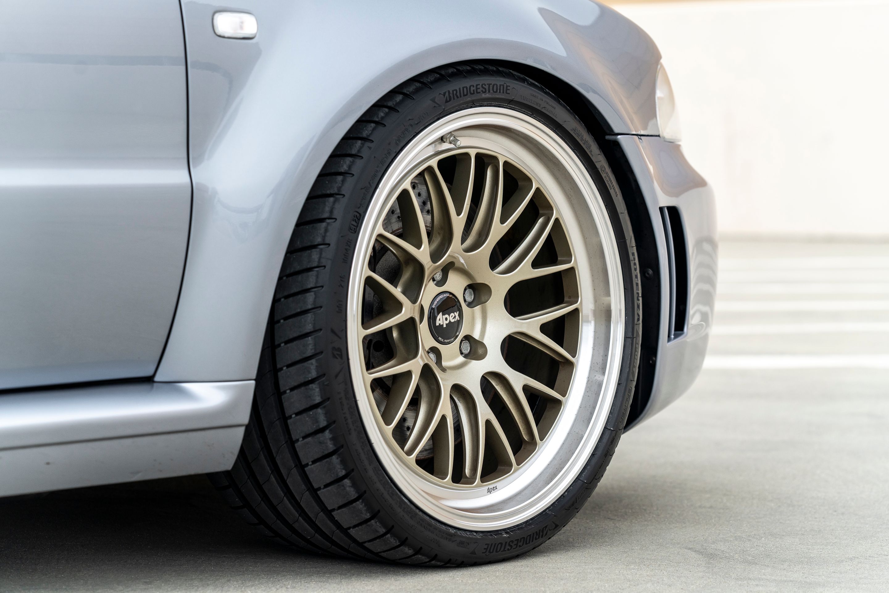 Silver Audi B5 RS 4 Avant/Wagon with 19" ML-10RT Apex wheels in Machined Lip Gloss Motorsport Gold