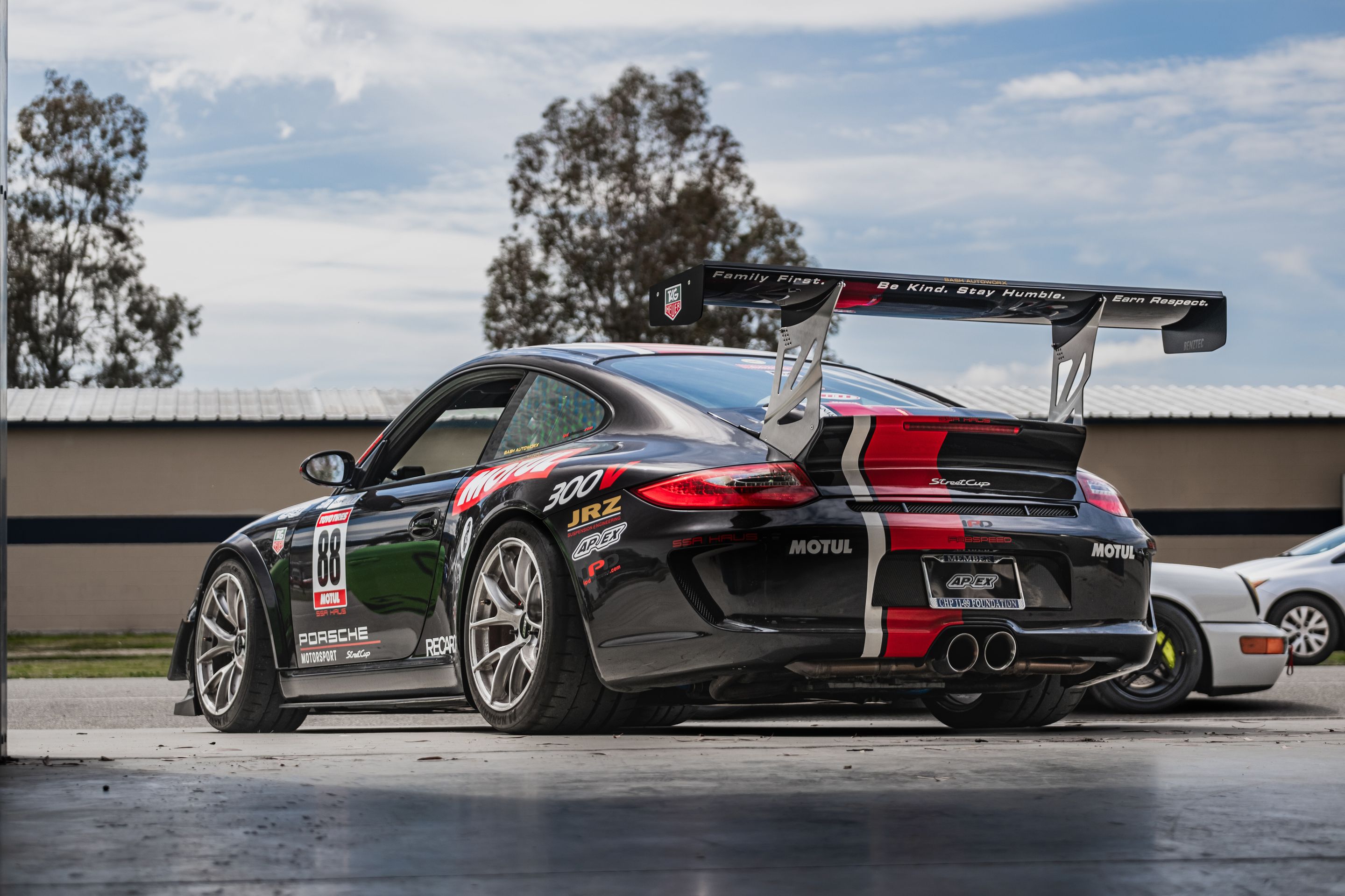 Black Porsche 911 997 Carrera S with 18" VS-5RS Apex wheels in Brushed Clear