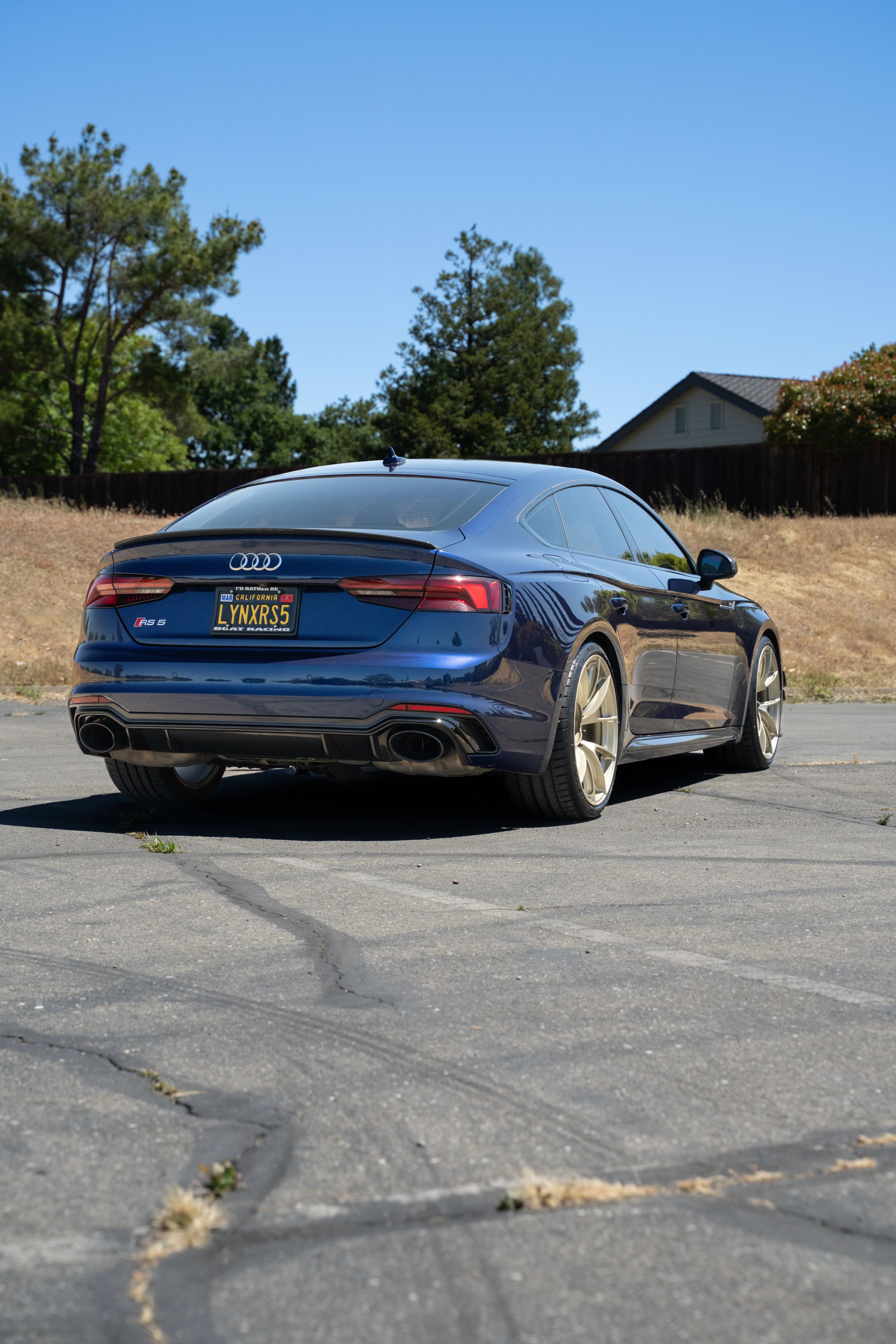 Blue Audi B9 RS 5 Sportback with 20" VS-5RS Apex wheels in Motorsport Gold