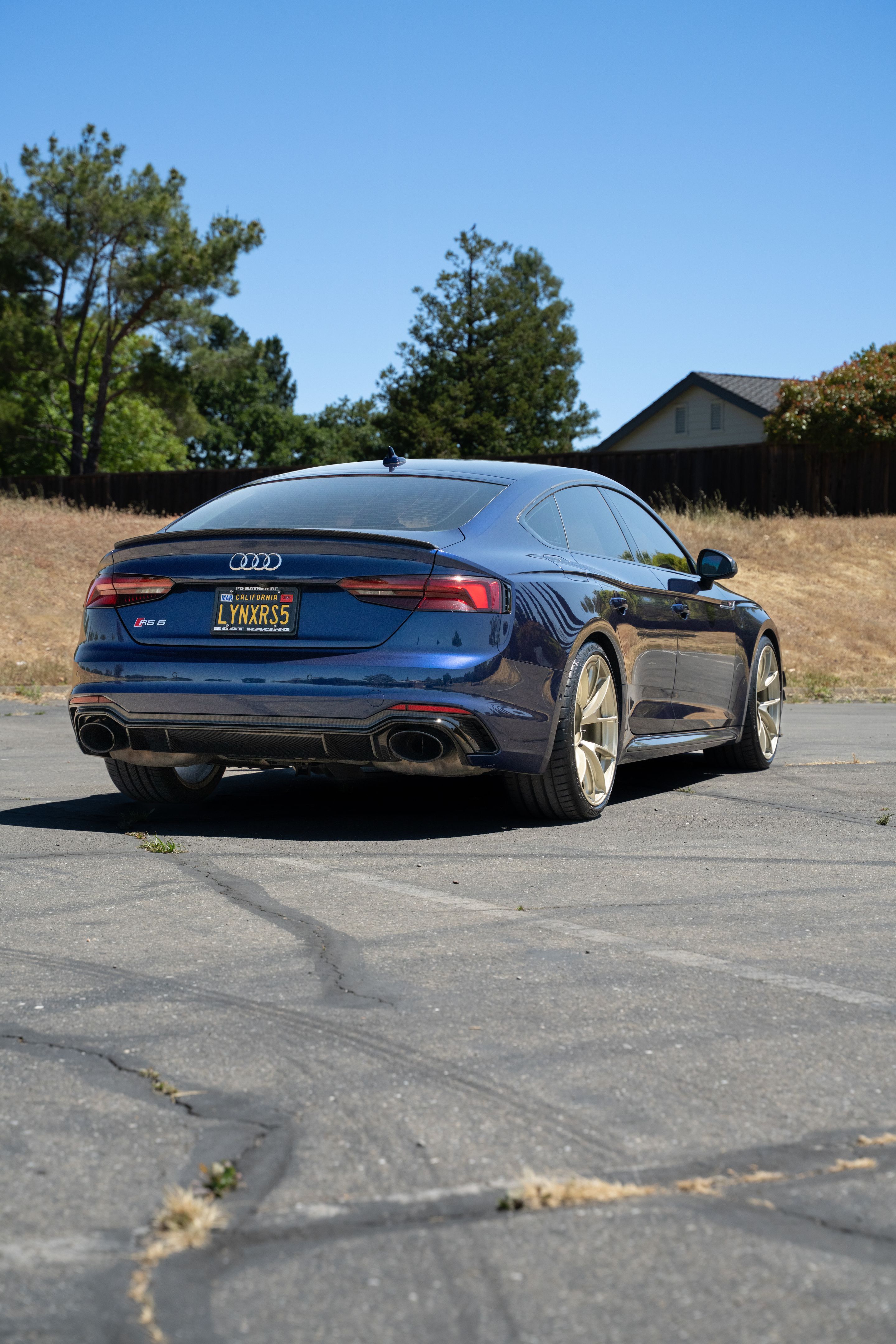 Blue Audi B9 RS 5 Sportback with 20" VS-5RS Apex wheels in Motorsport Gold