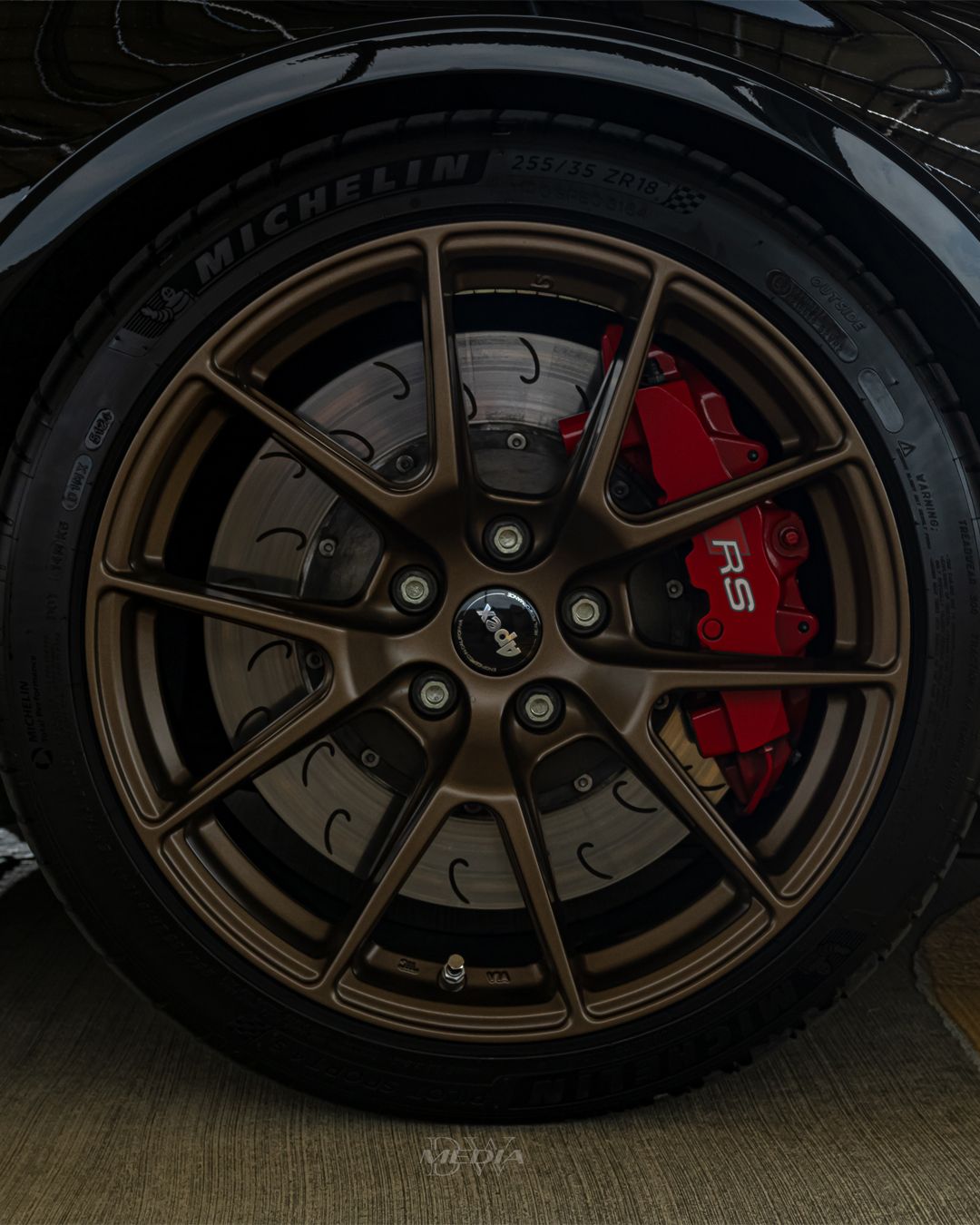 Black Audi 8V RS 3 with 18" VS-5 Apex wheels in Satin Bronze