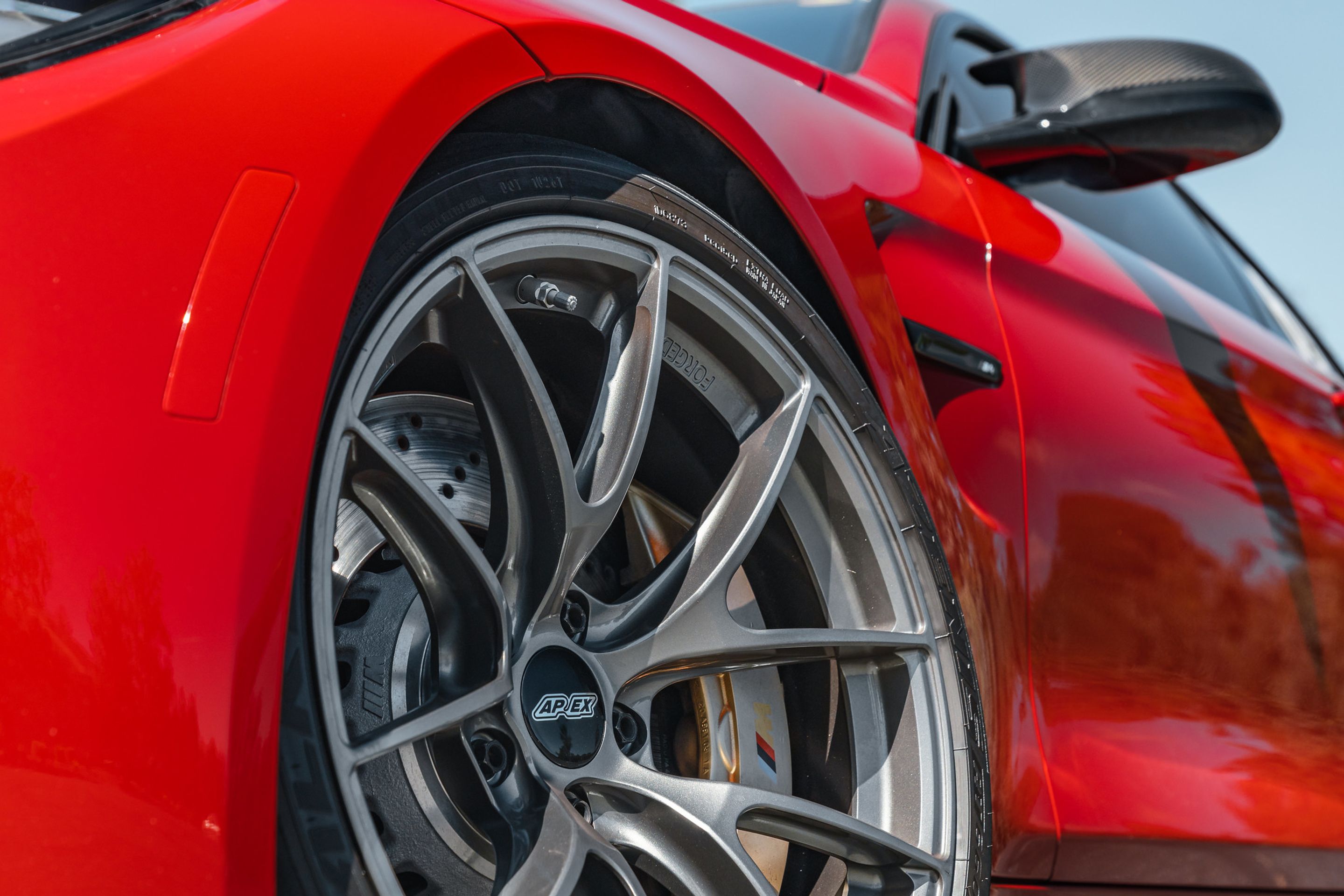 Red BMW F82 Coupe M4 with 19" VS-5RS Apex wheels in Anthracite