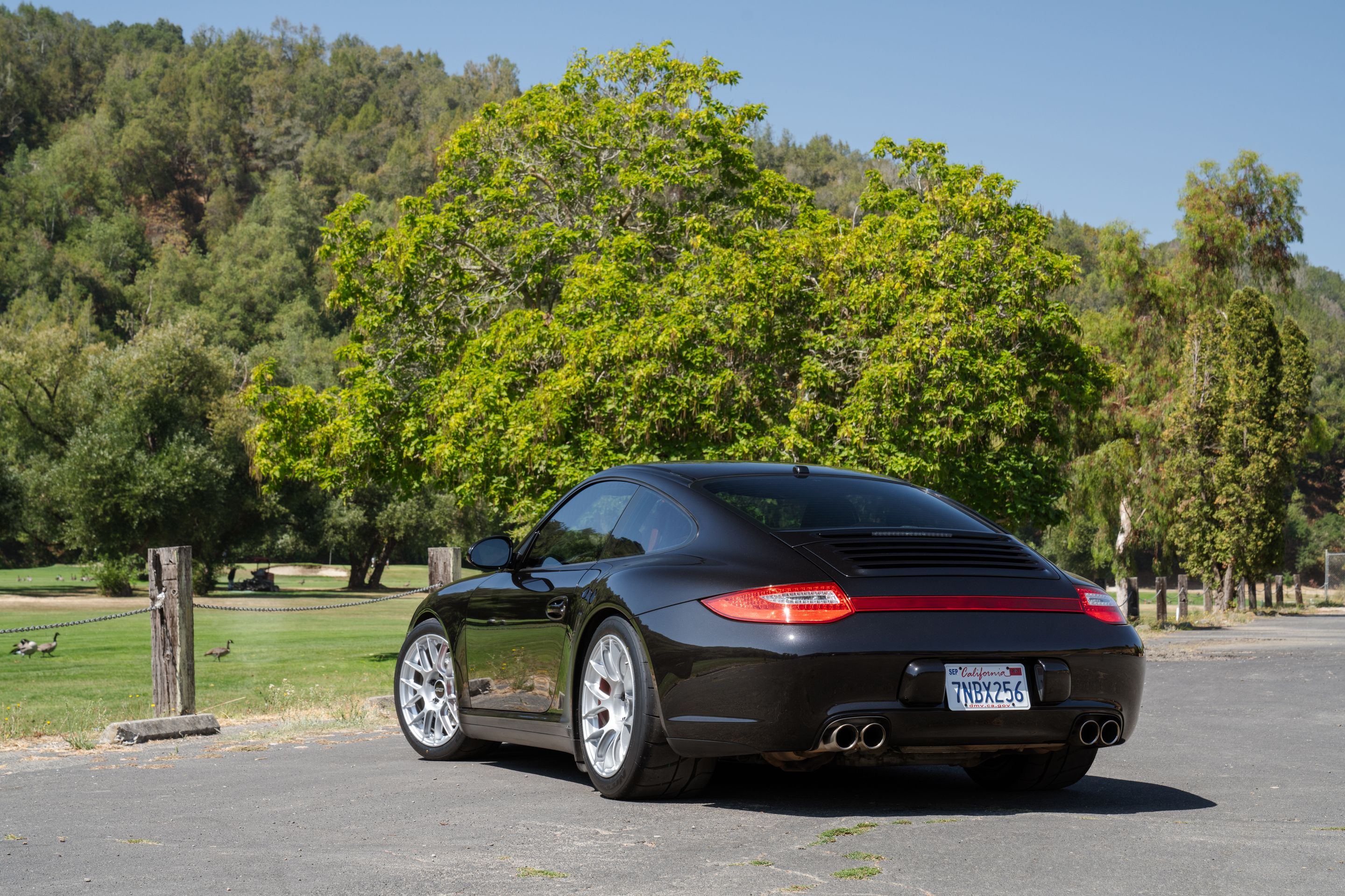 Black Porsche 911 997 Carrera 4S with 18" EC-7RS Apex wheels in Race Silver