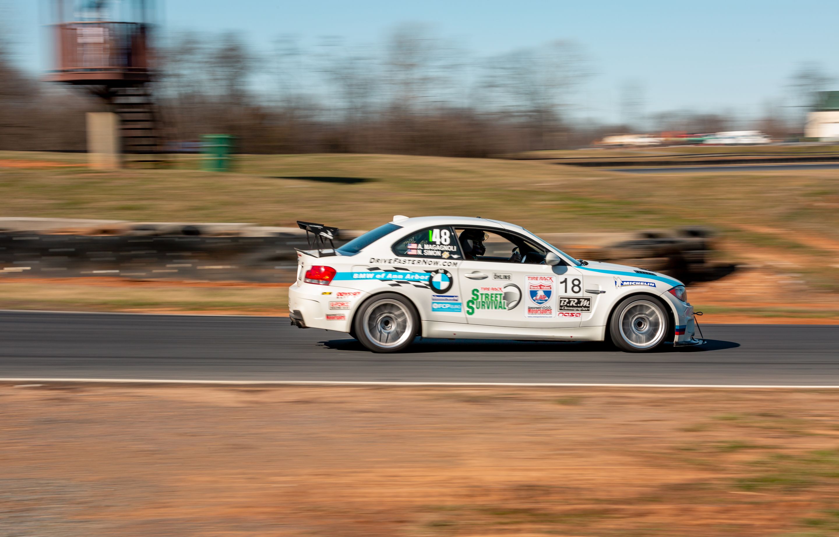 White BMW E82 1M with 18" ARC-8 Apex wheels in Hyper Silver