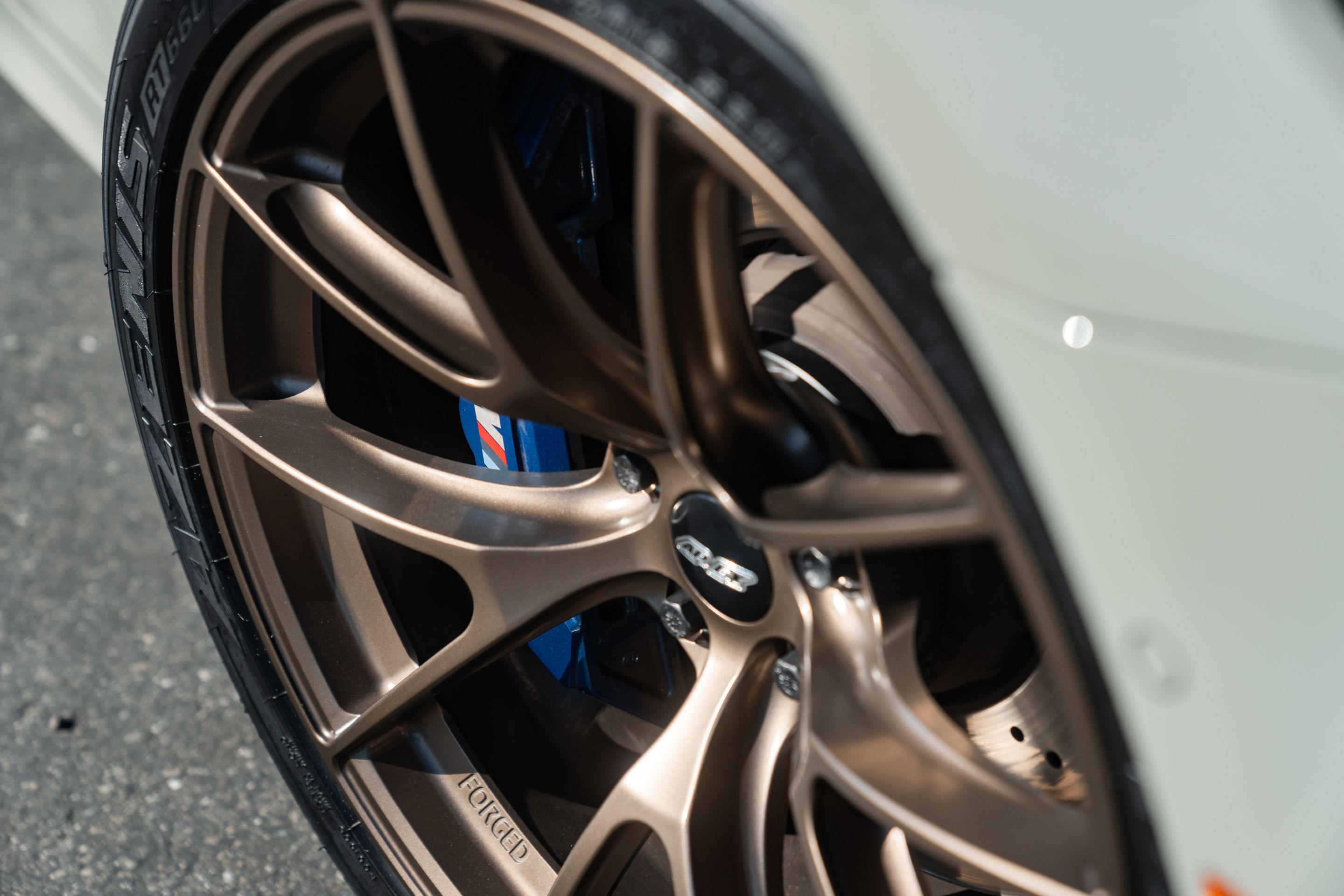 Grey BMW F90 M5 with 19" VS-5RS Apex wheels in Satin Bronze