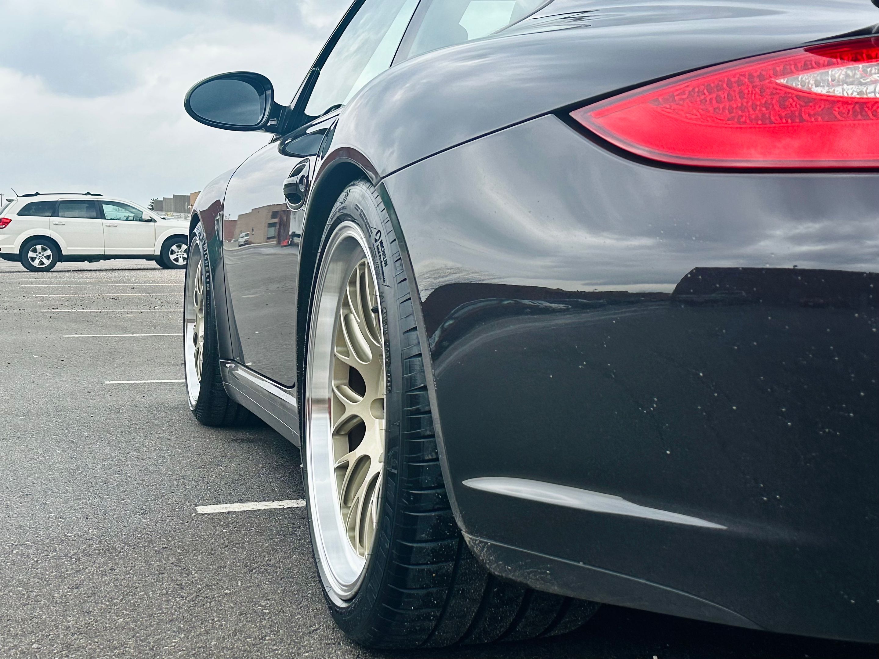 Black Porsche 911 997 Carrera 4S with 19" ML-10RT Apex wheels in Machined Lip Gloss Motorsport Gold
