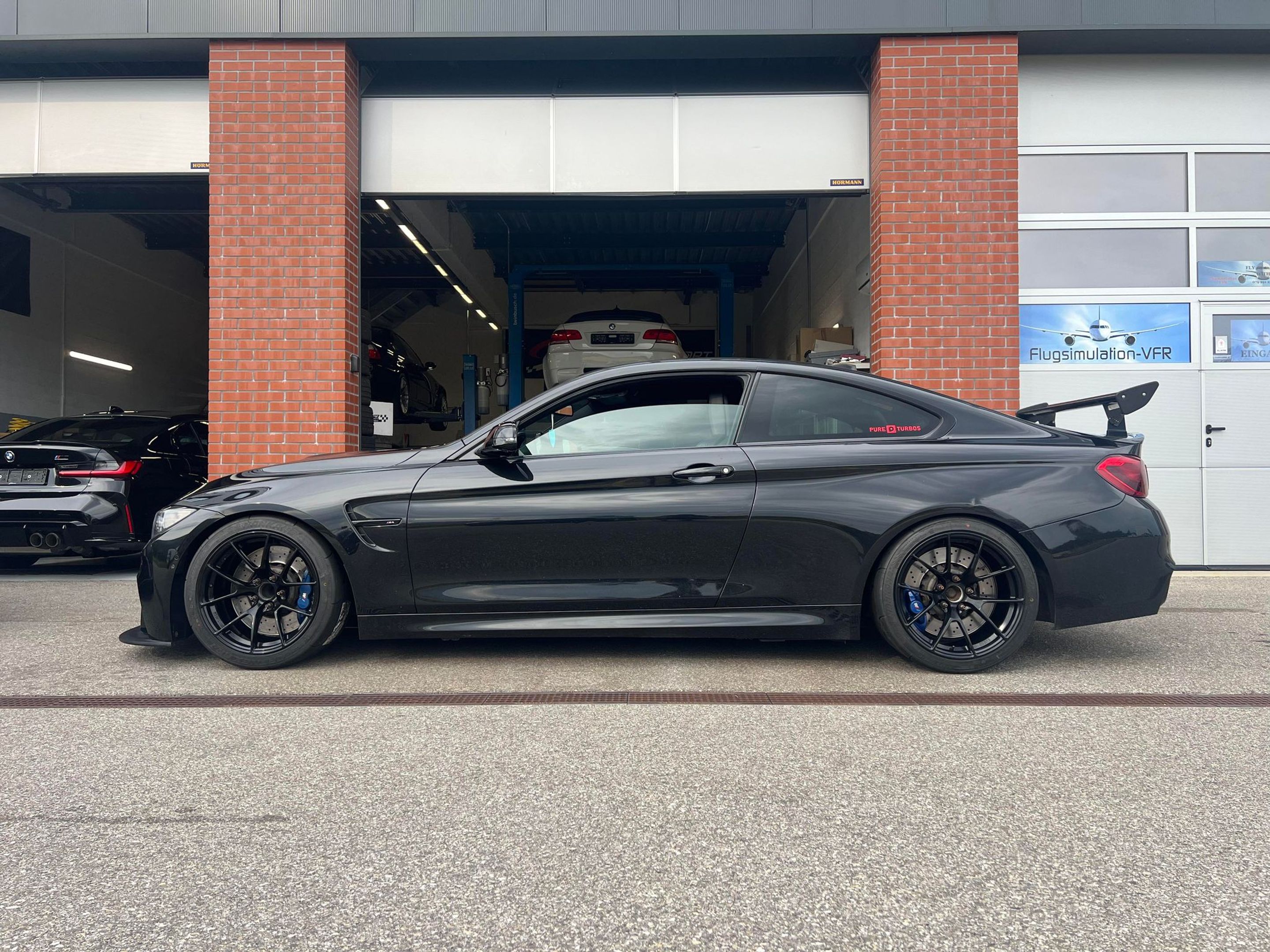 Black BMW F82 Coupe M4 with 18" VS-5RS Apex wheels in Satin Black