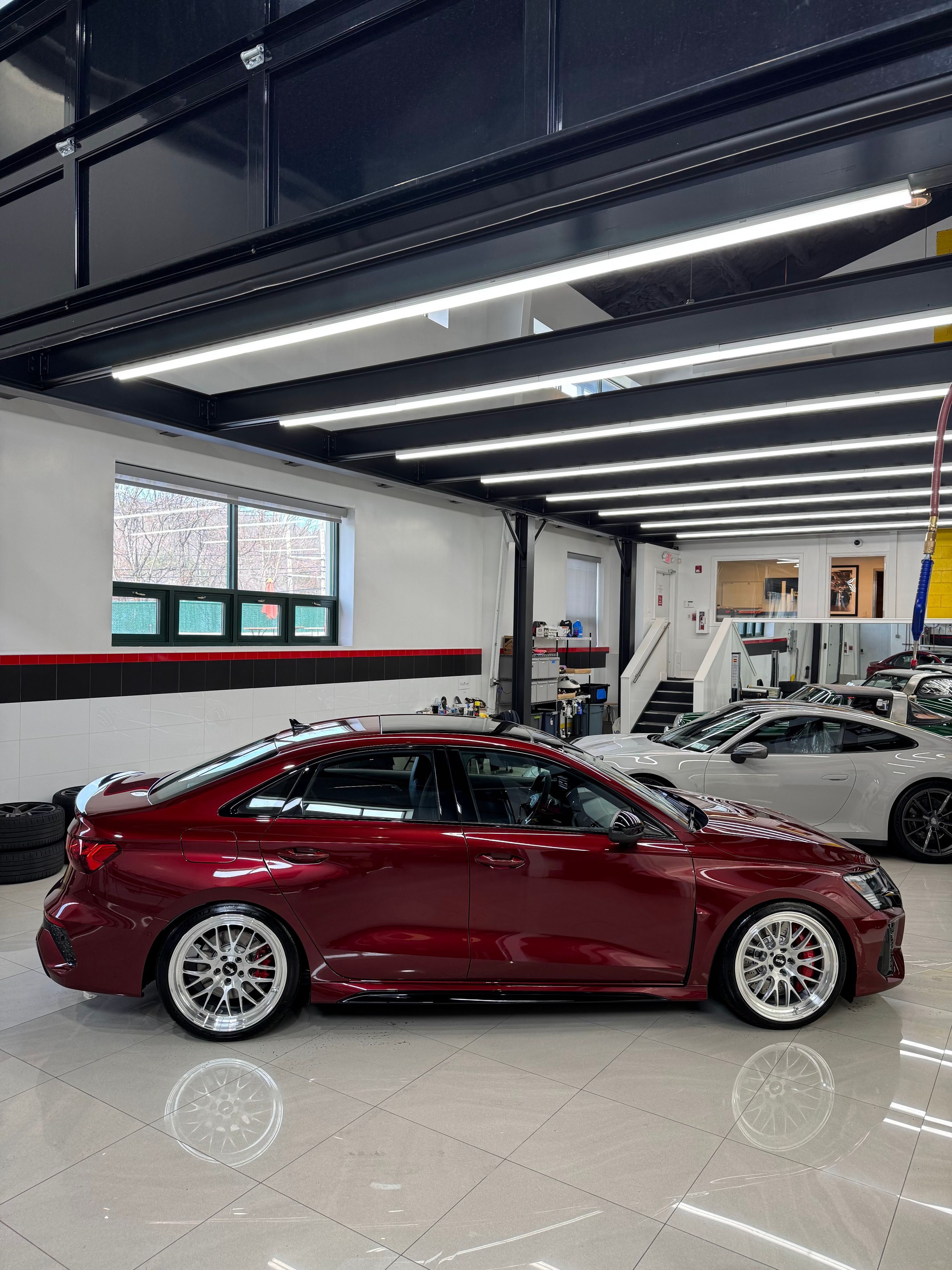 Red Audi 8Y RS 3 with 19" ML-10RT Apex wheels in Machined Lip Brushed Clear