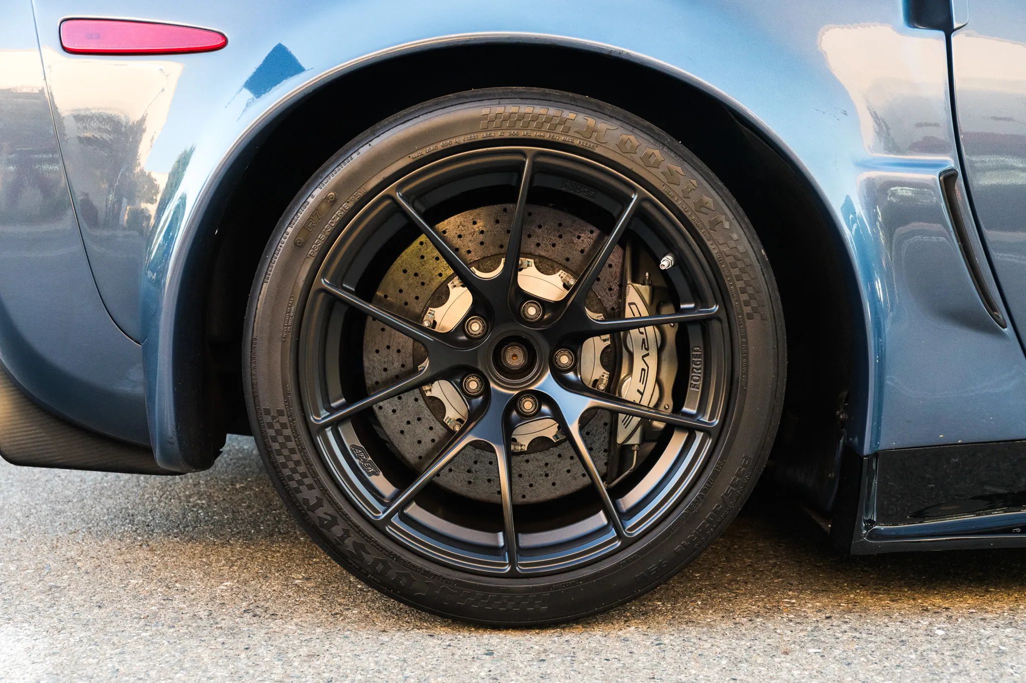 Blue Chevrolet C6 Corvette Z06 with 18" VS-5RS Apex wheels in Satin Black