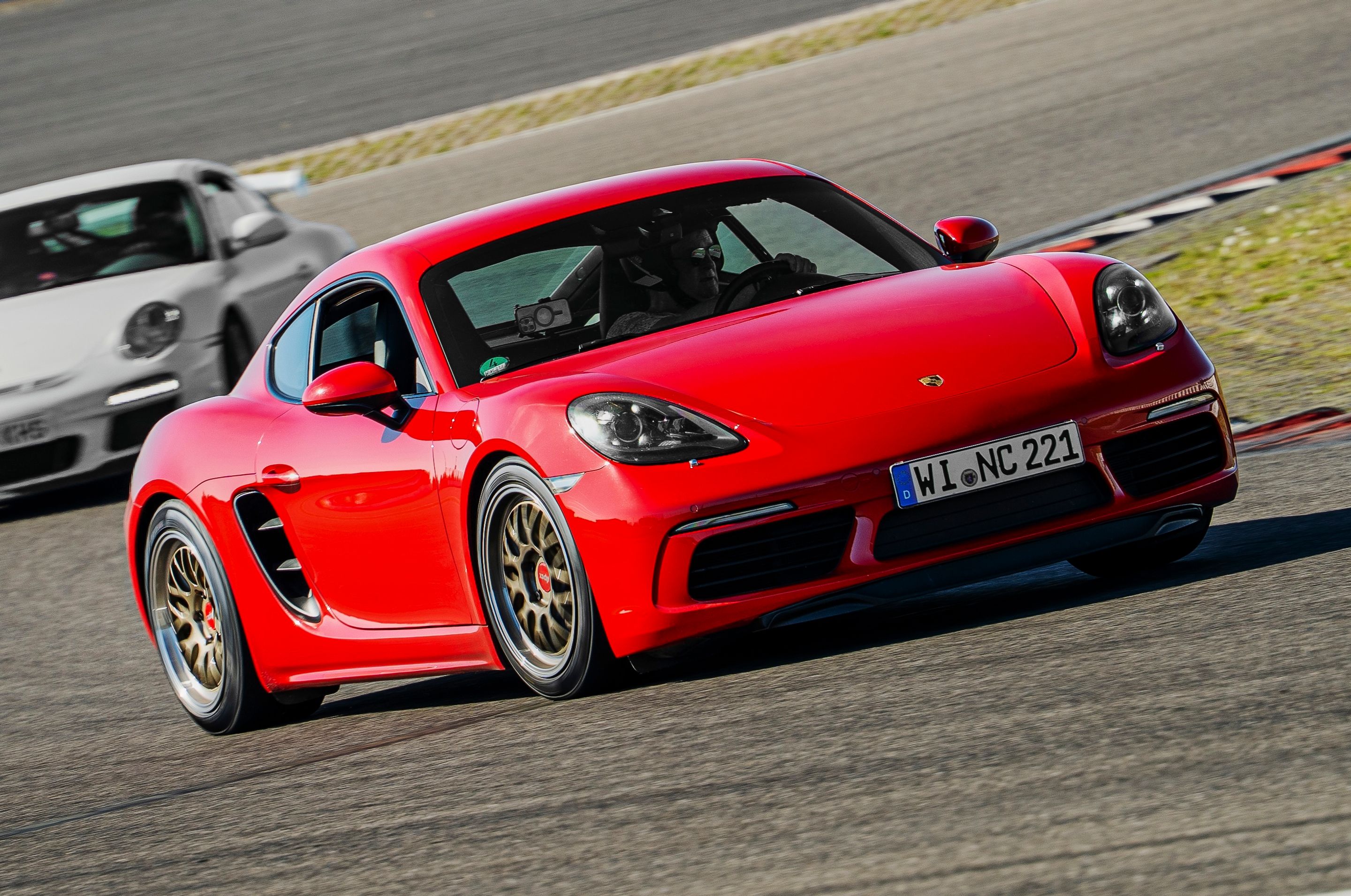 Red Porsche 718 Cayman S with 18" ML-10RT Apex wheels in Machined Lip Gloss Motorsport Gold