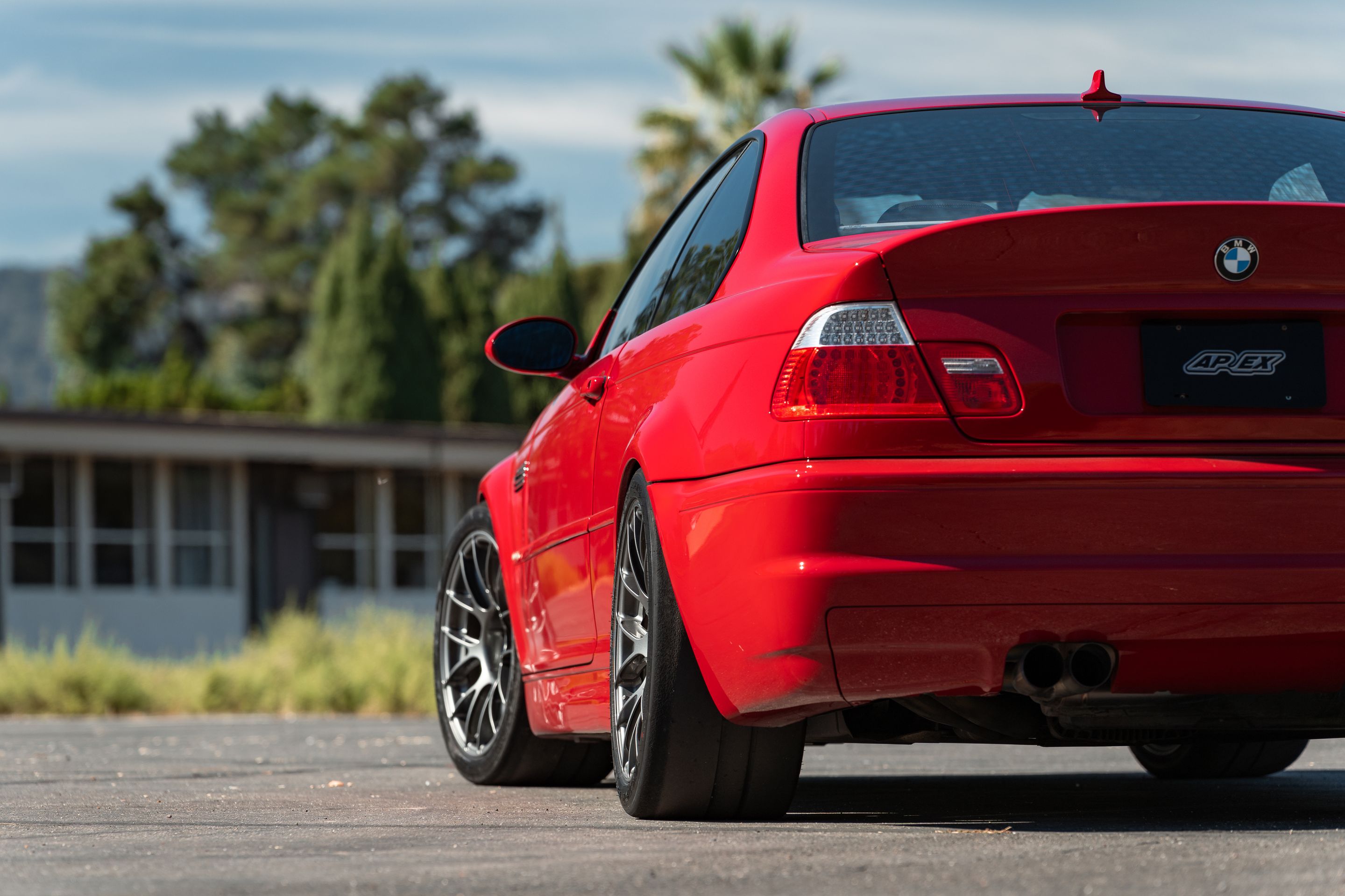 Red BMW E46 M3 with 18" EC-7RS Apex wheels in Anthracite