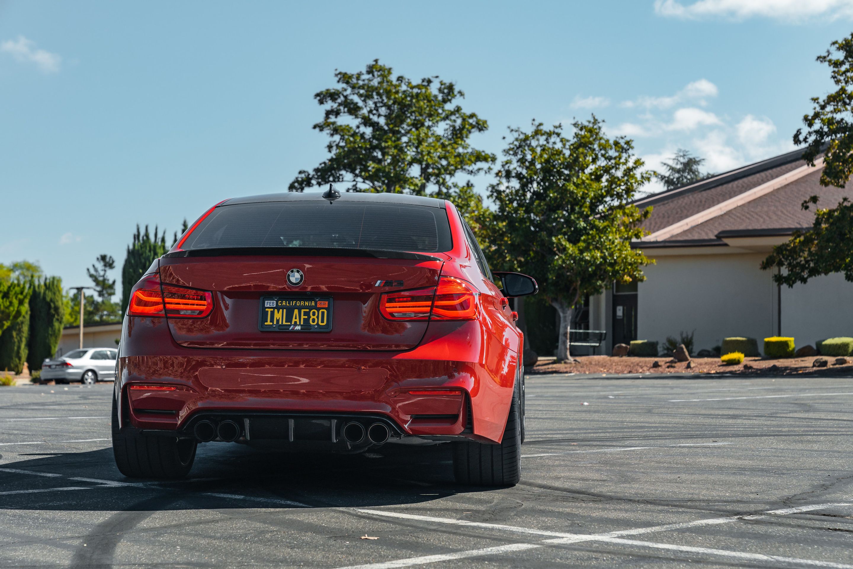 Red BMW F80 M3 with 20" VS-5RS Apex wheels in Anthracite