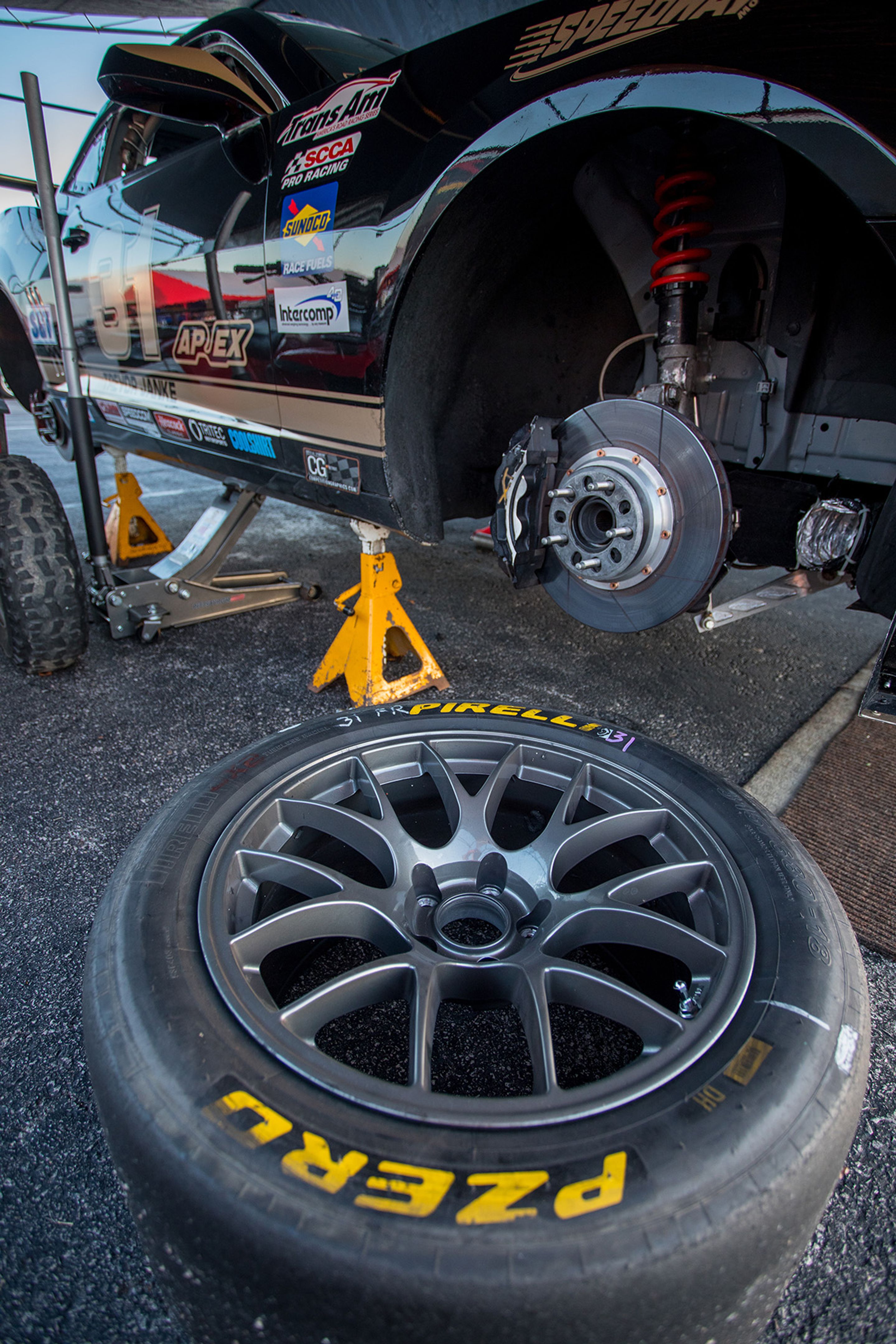 Black Chevrolet 5th Gen Camaro SS with 18" EC-7 Apex wheels in Anthracite