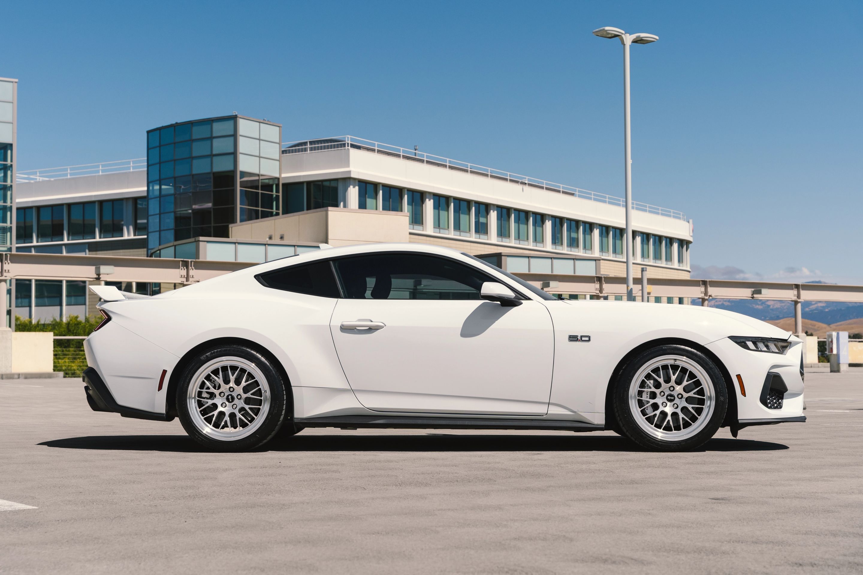White Ford S650 Mustang GT with 19" ML-10RT Apex wheels in Machined Lip Brushed Clear