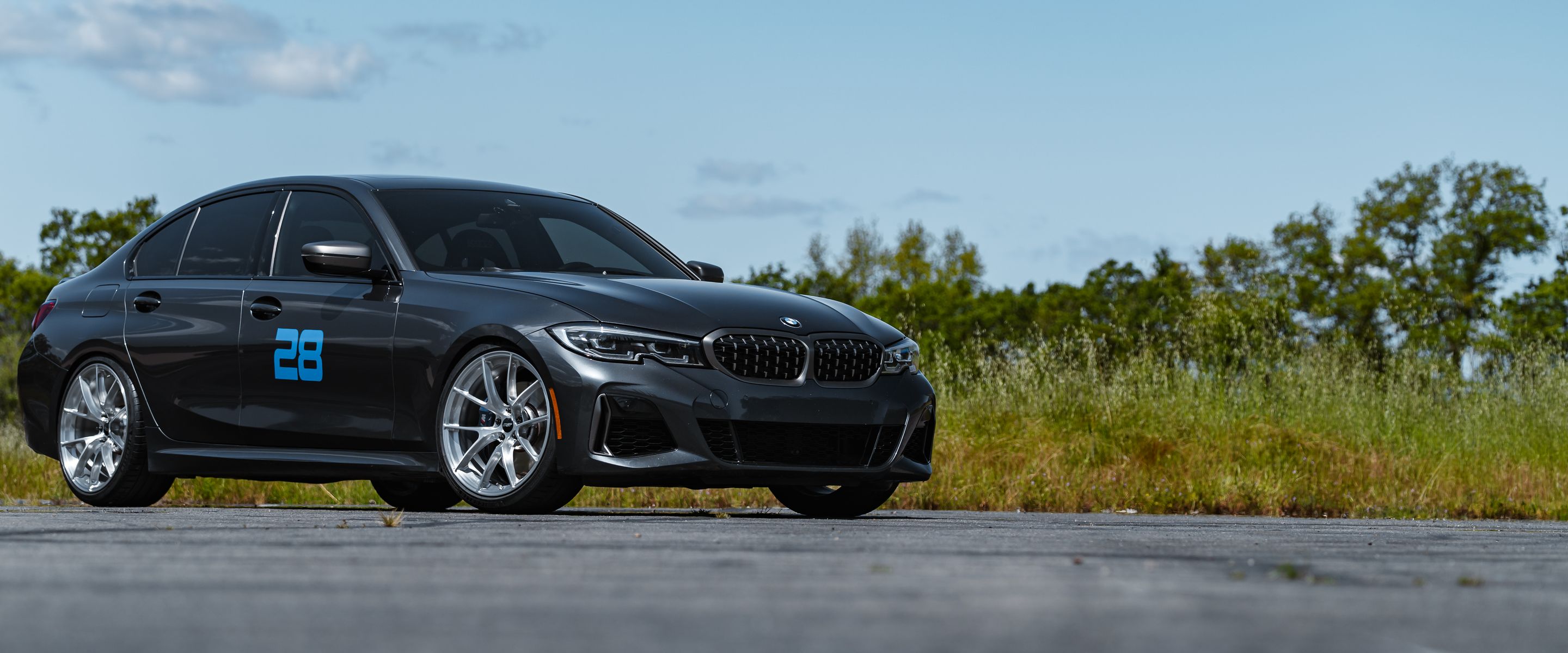 Grey BMW G20 Sedan 3 Series with 20" VS-5RS Apex wheels in Brushed Clear