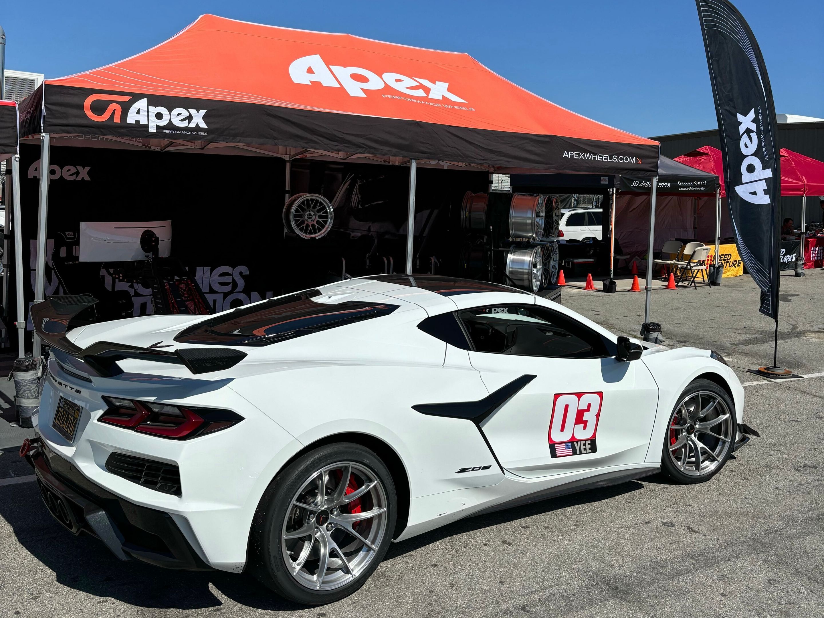 White Chevrolet C8 Corvette Z06 with 19" VS-5RS Apex wheels in Brushed Clear