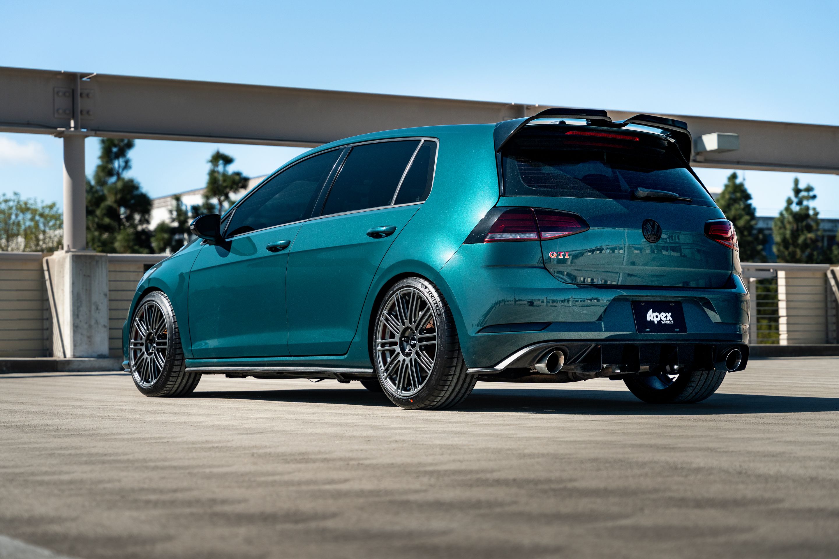 Green VW MK7 GTI with 18" TC-10RT Apex wheels in Anthracite
