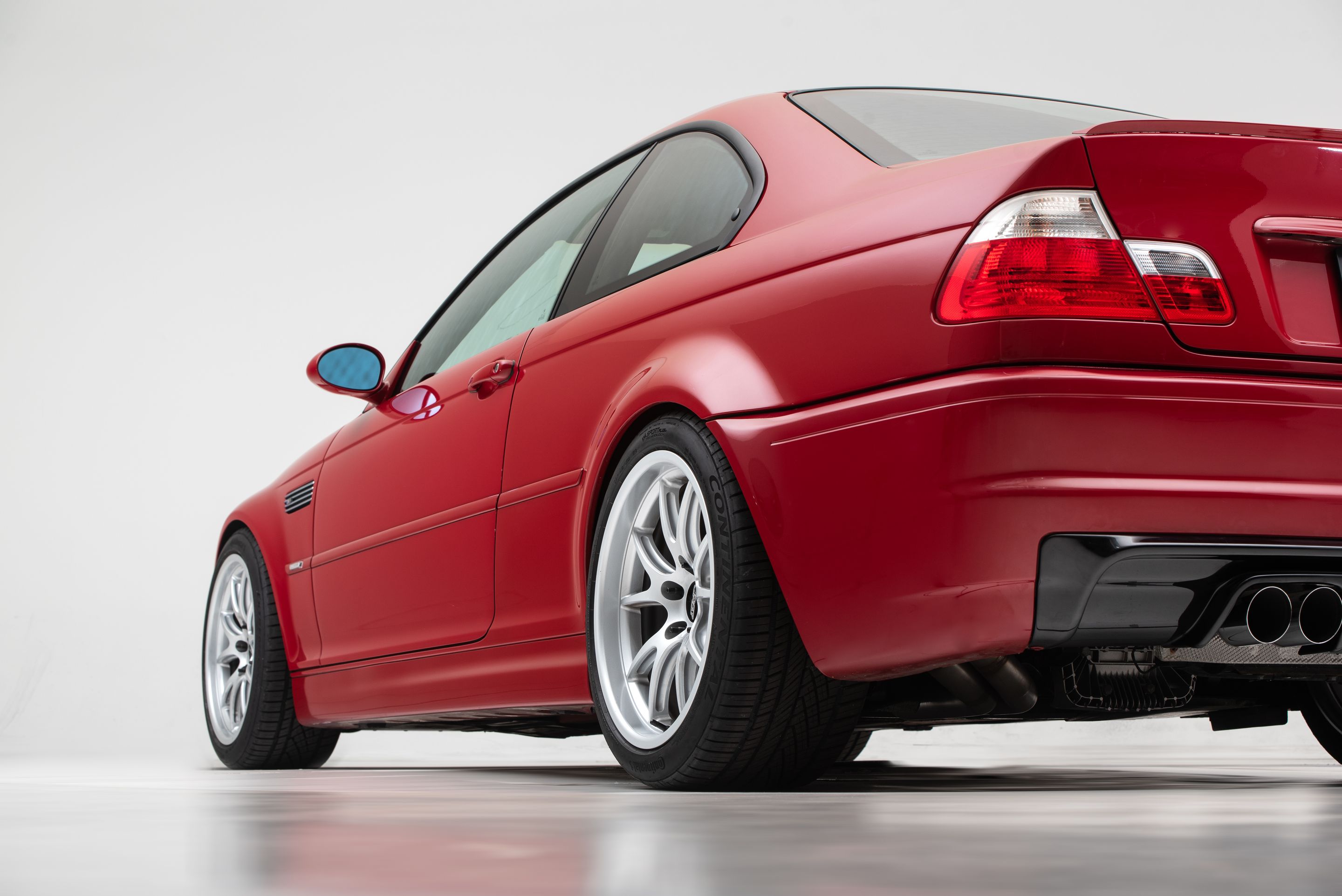 Red BMW E46 M3 with 18" FL-5 Apex wheels in Race Silver