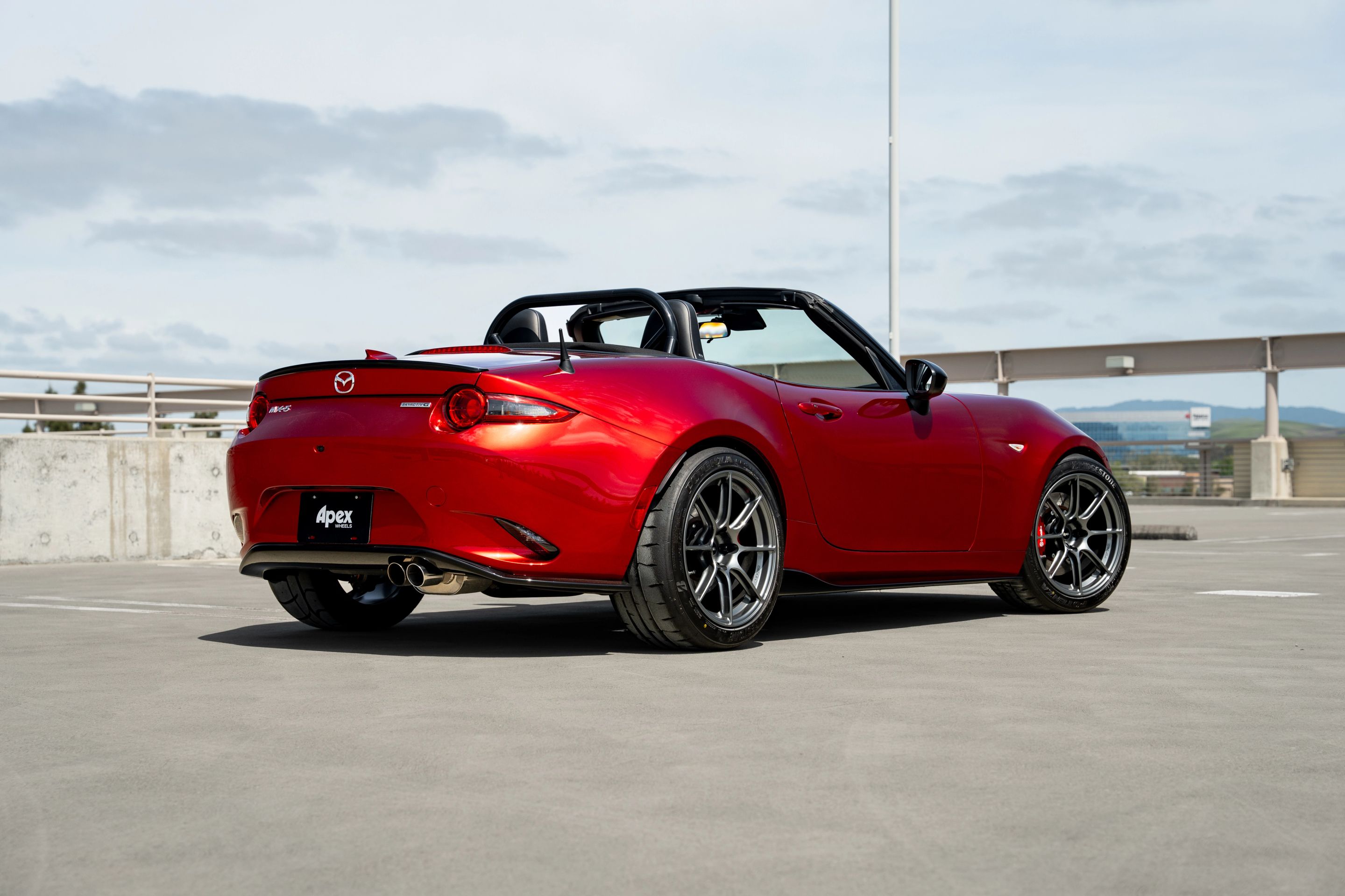 Red Mazda ND MX-5 Miata with 17" SM-8RS Apex wheels in Anthracite