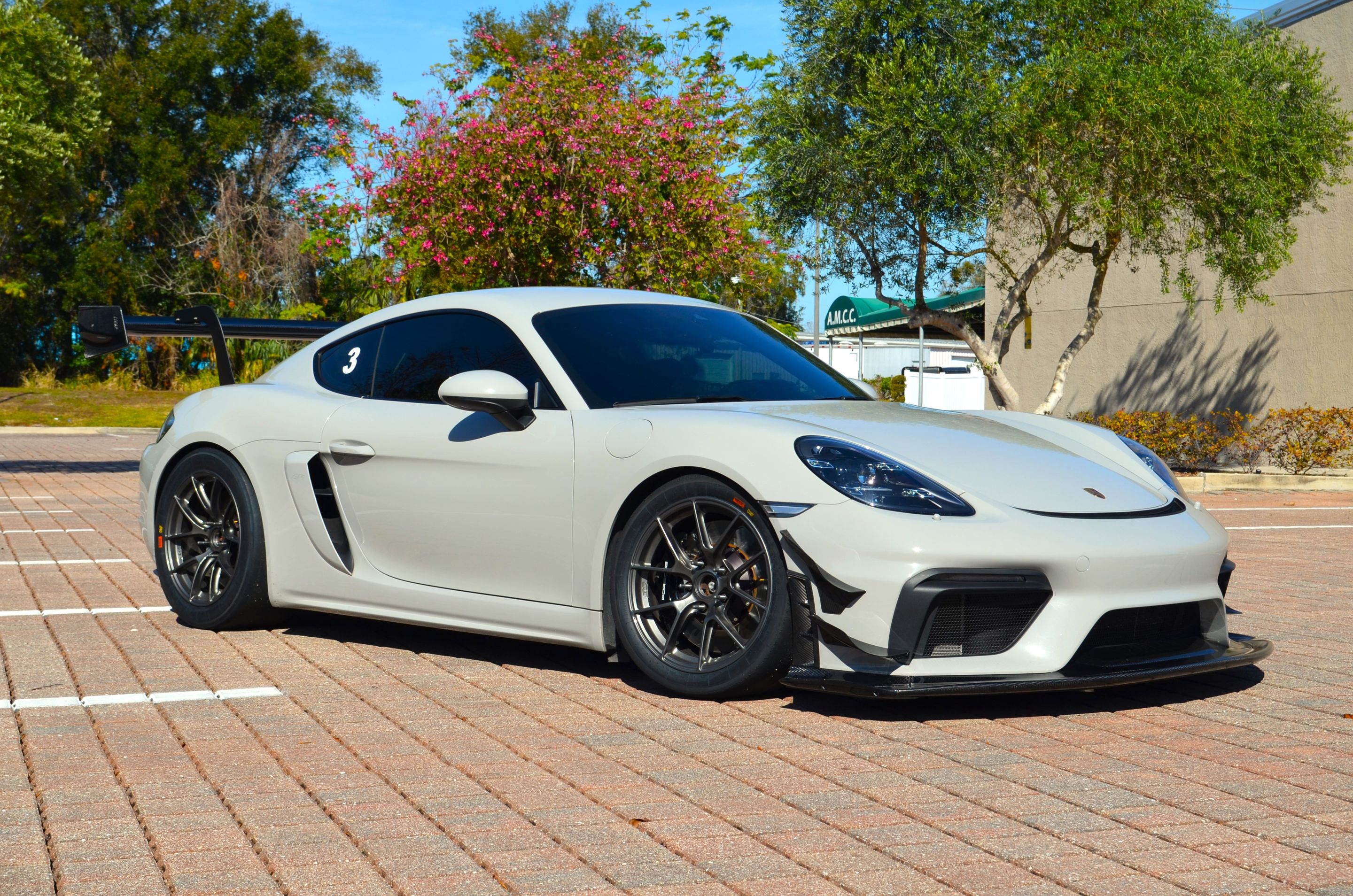 Grey Porsche 718 Cayman GT4 with 18" VS-5RS Apex wheels in Anthracite