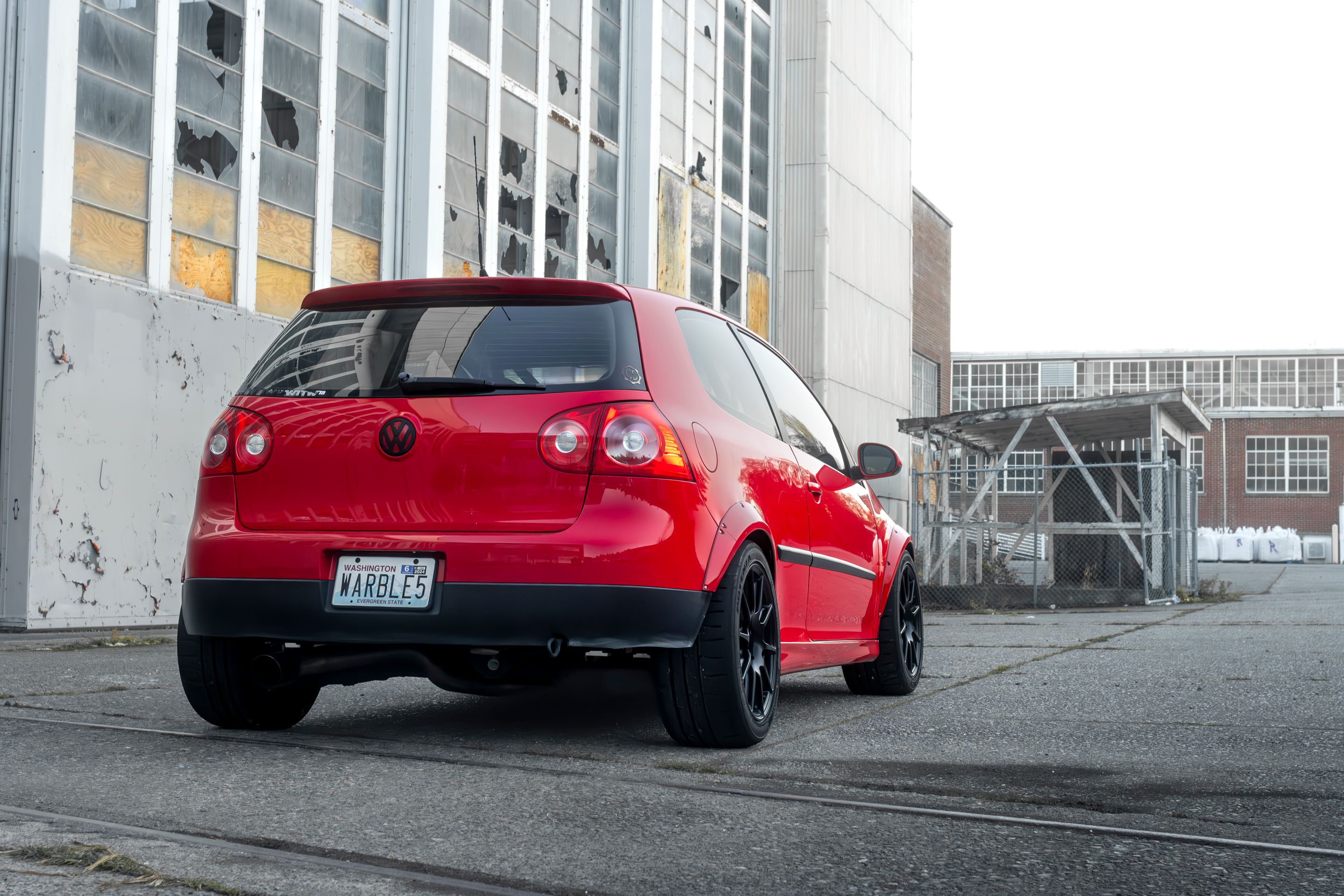 Red VW MK5 Golf with 17" SM-10 Apex wheels in Satin Black