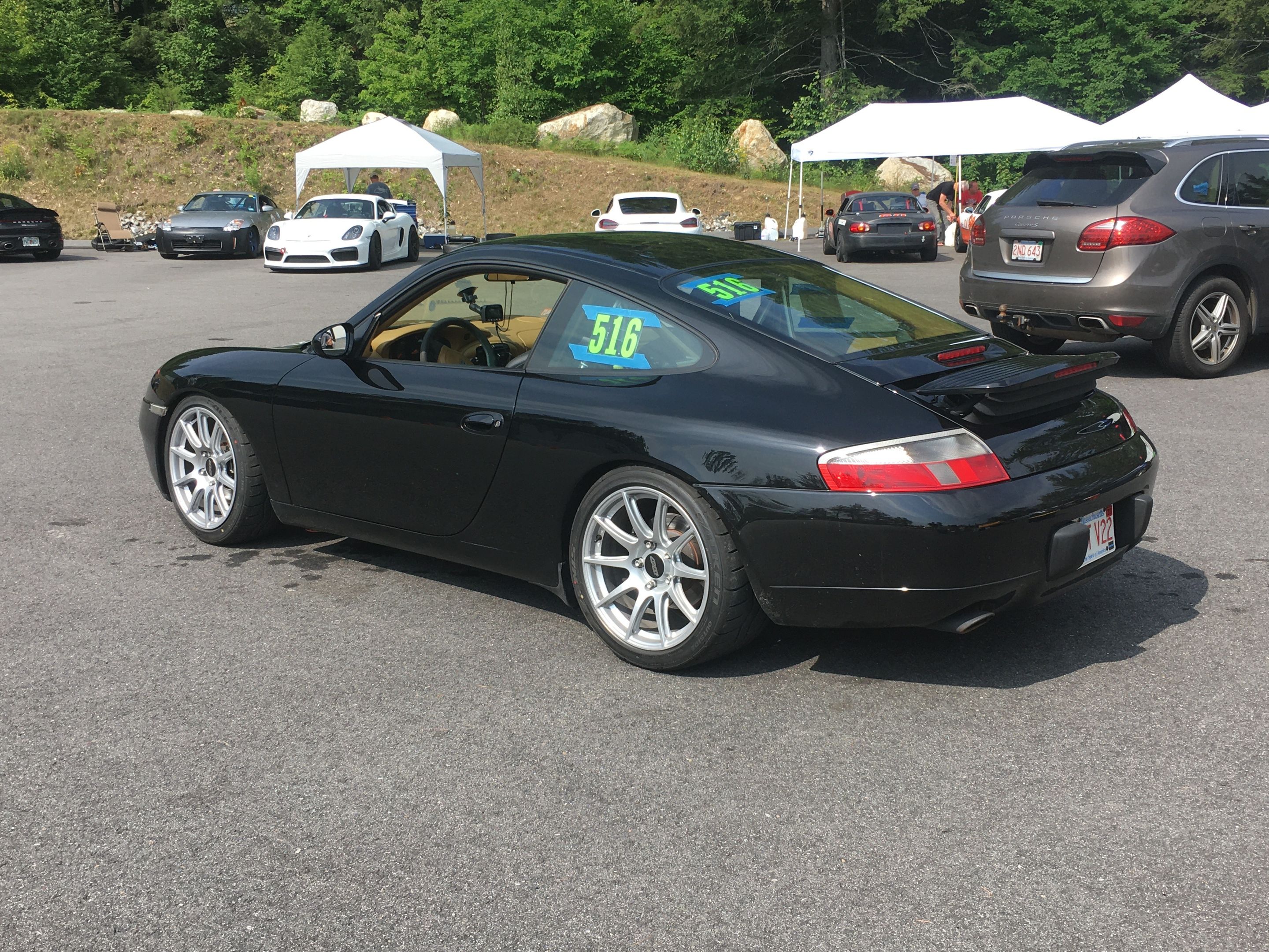 Black Porsche 911 996 Carrera with 18" SM-10 Apex wheels in Race Silver