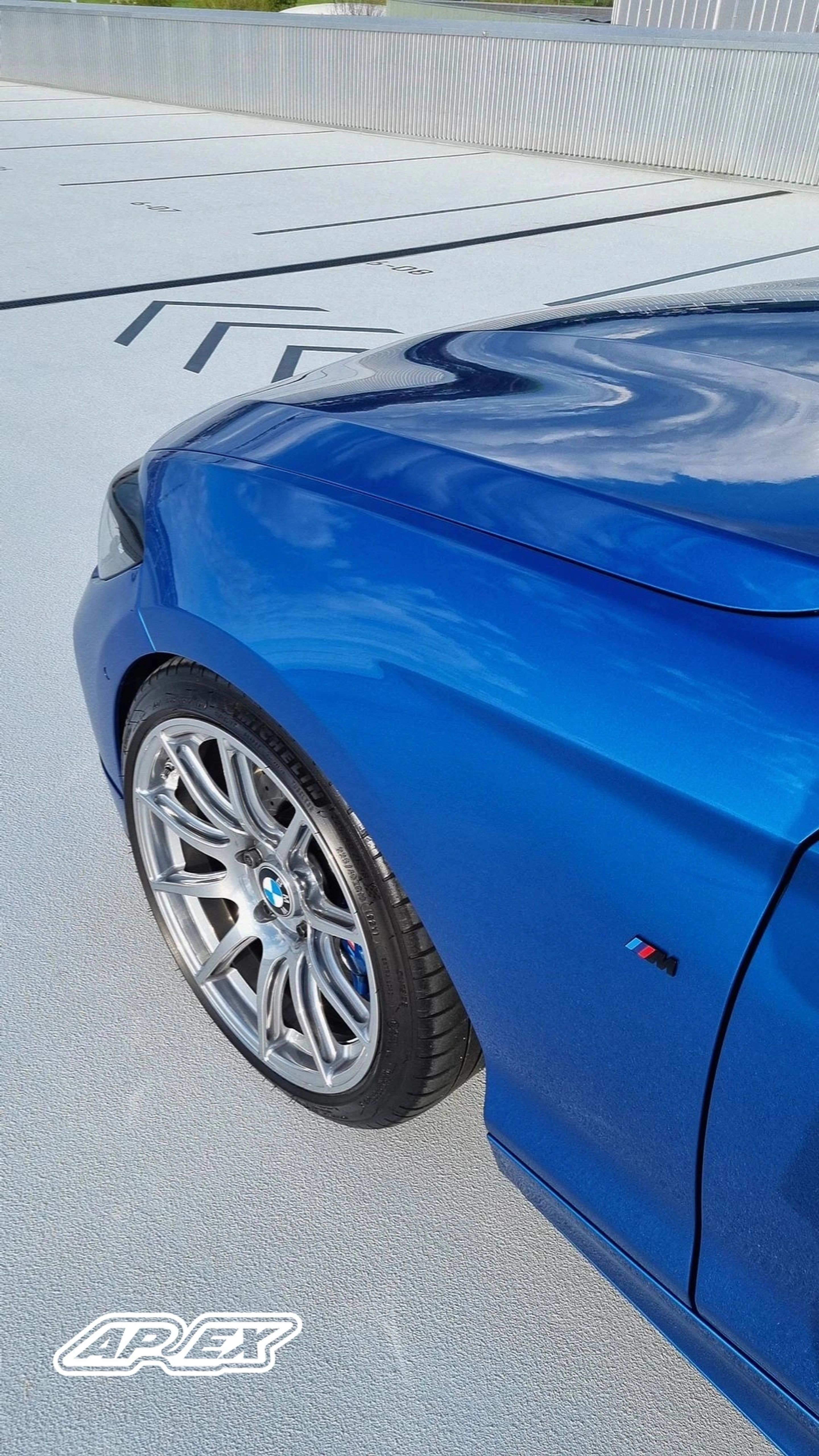 Blue BMW F20 Hatchback 1 Series with 18" SM-10 Apex wheels in Custom Finish