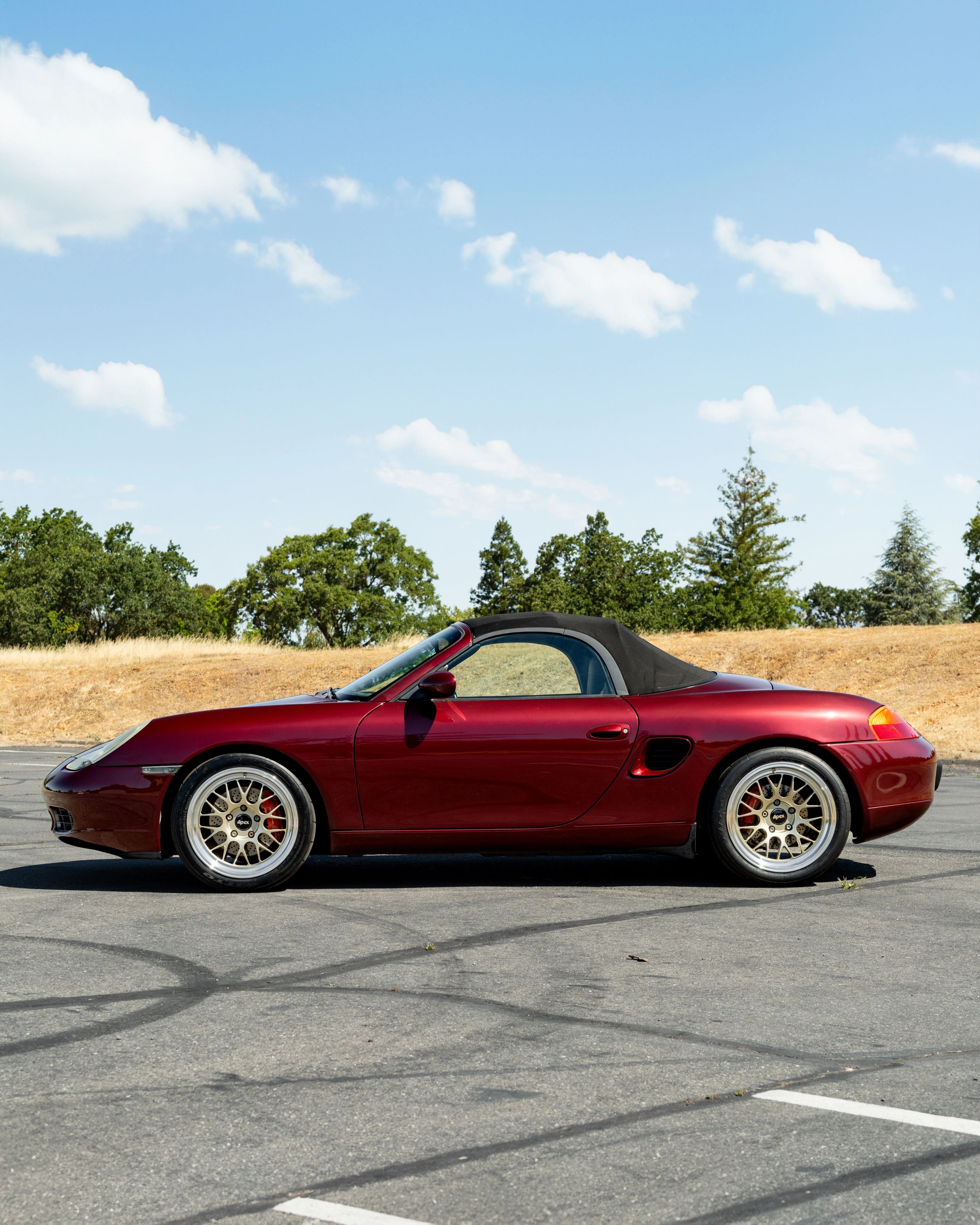 Red Porsche 986 Boxster with 18" ML-10RT Apex wheels in Machined Lip Gloss Motorsport Gold