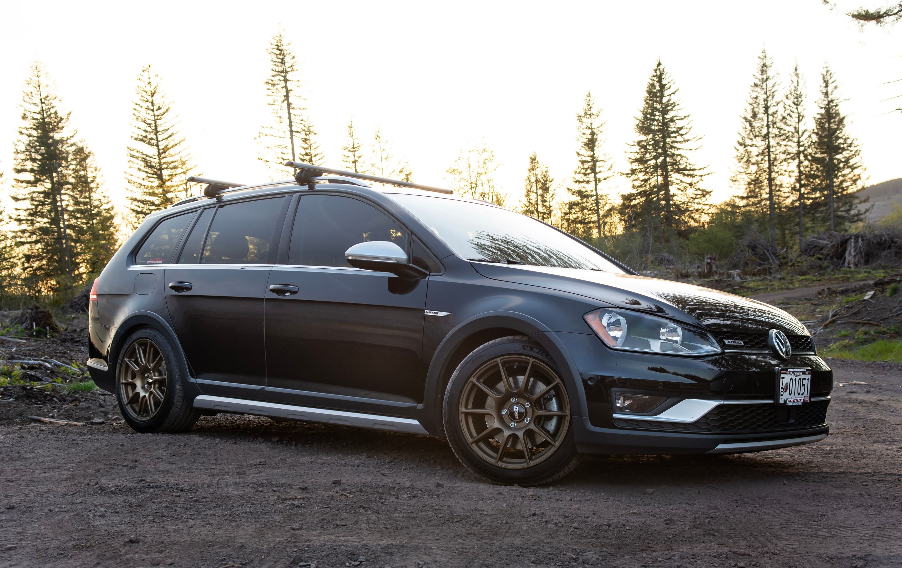 Black VW MK7 Alltrack/SportWagen Golf SportWagen with 17" SM-10 Apex wheels in Satin Bronze