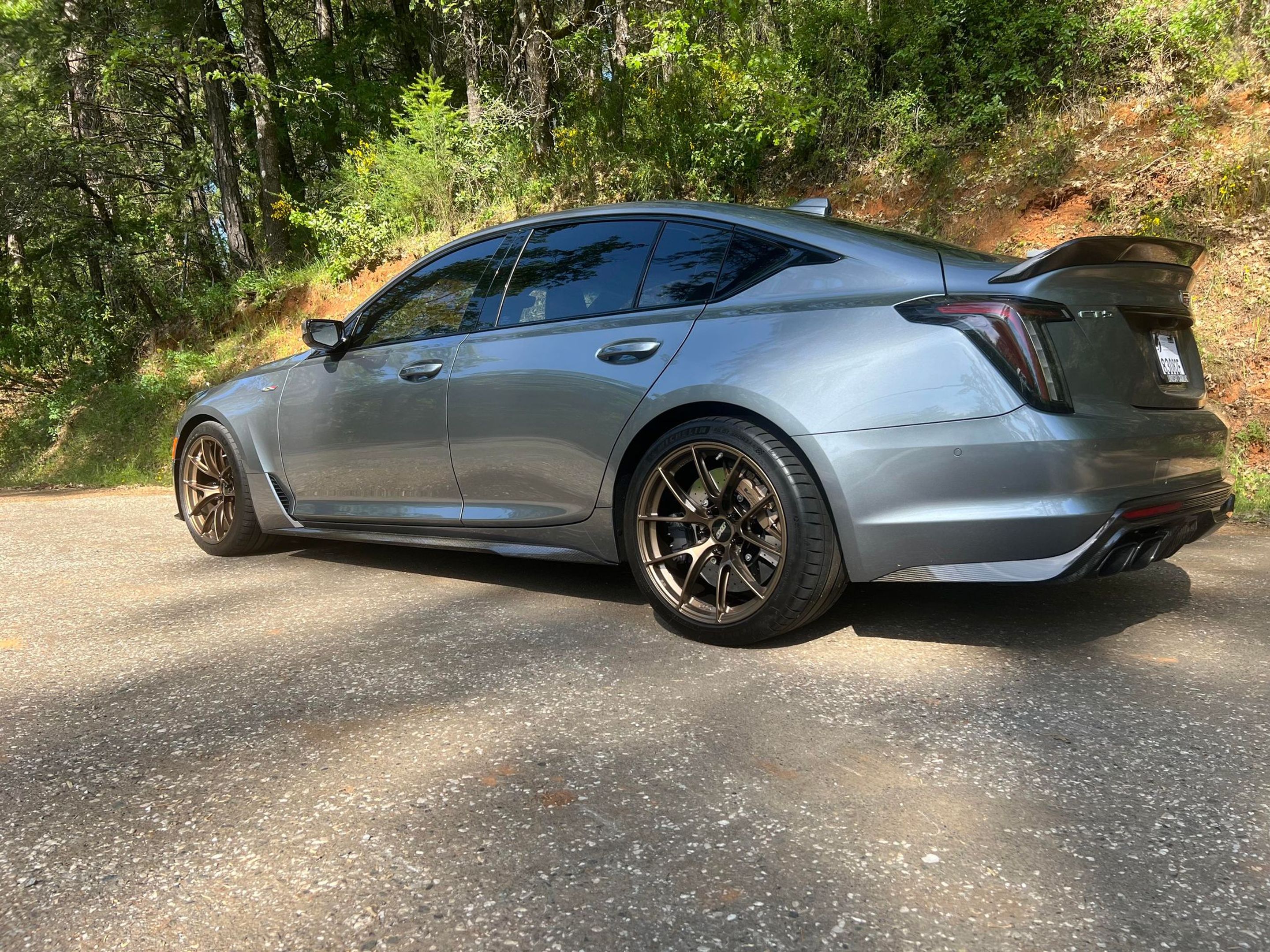 Grey Cadillac CT5-V Blackwing with 19" VS-5RS Apex wheels in Satin Bronze