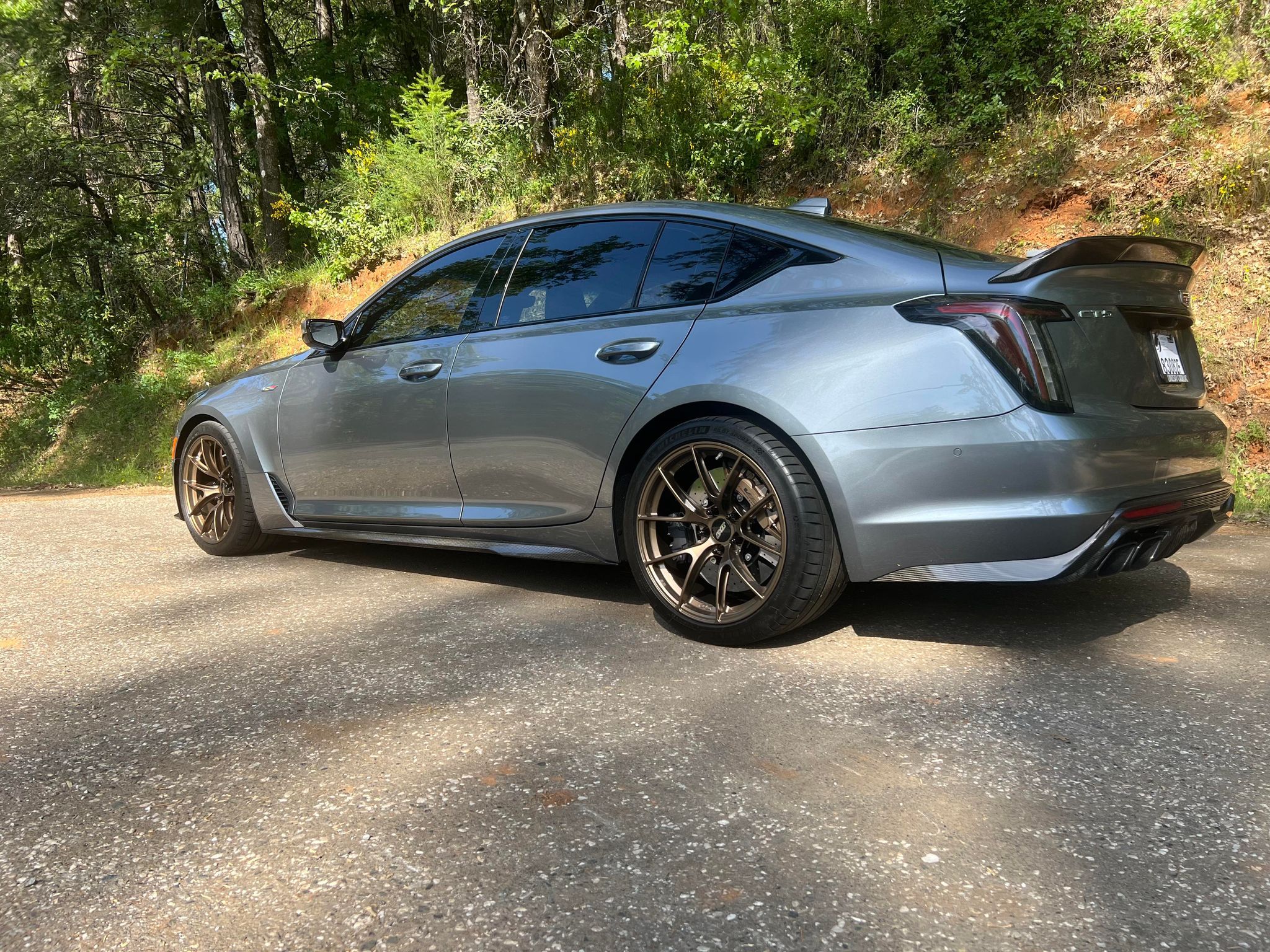 Grey Cadillac CT5-V Blackwing with 19" VS-5RS Apex wheels in Satin Bronze