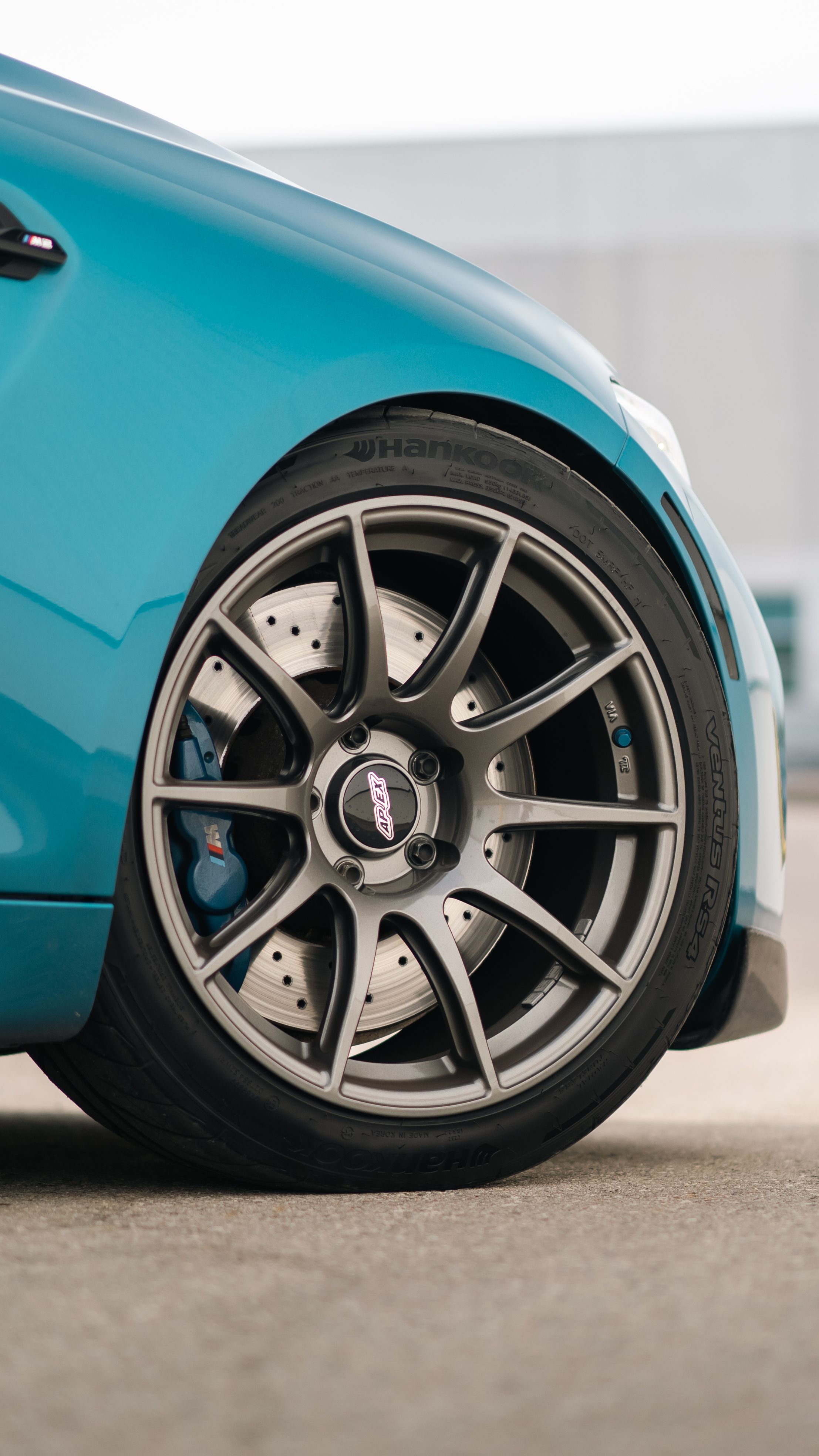 Blue BMW F87 M2 with 18" SM-10 Apex wheels in Anthracite