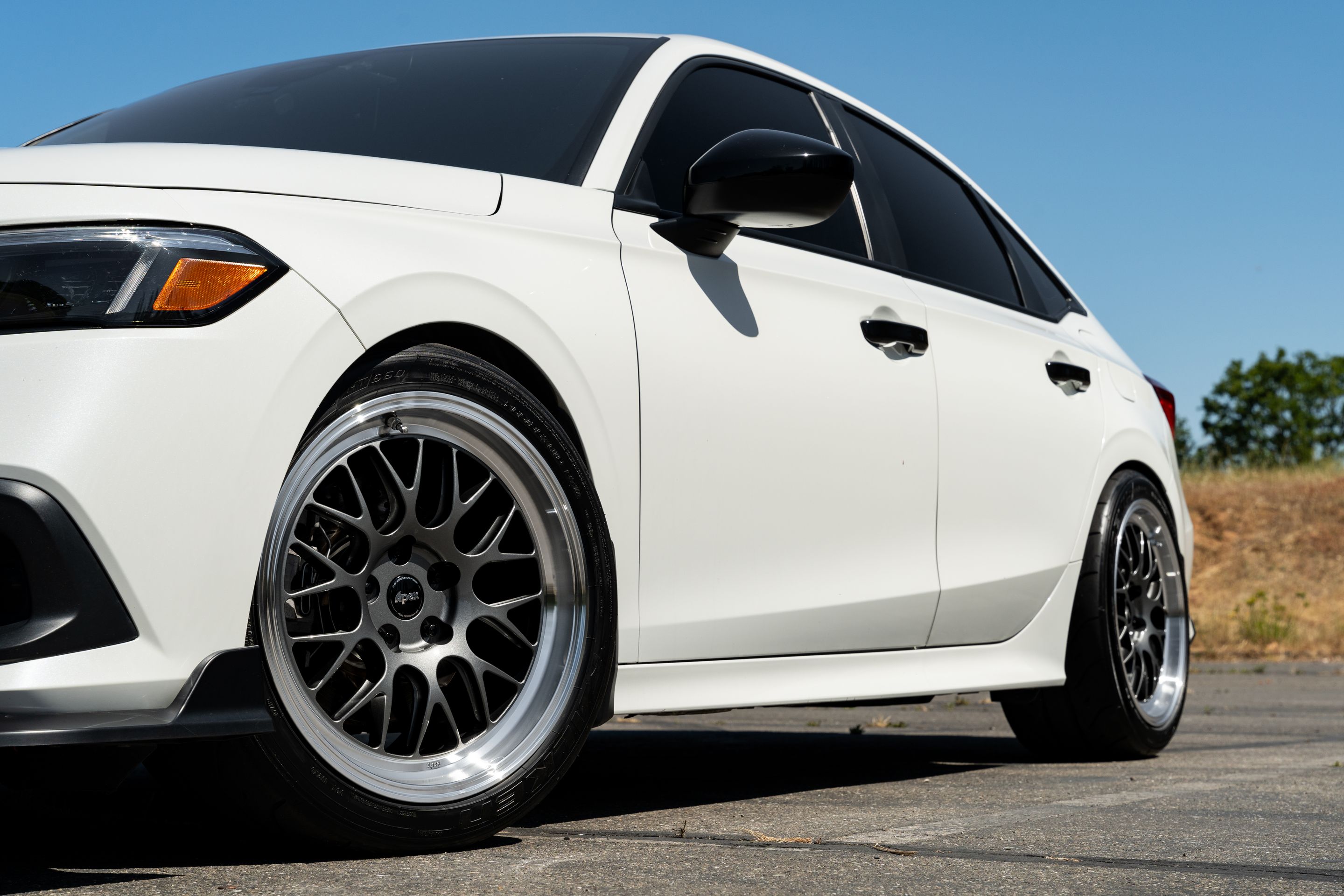 White Honda 11th Gen Civic with 18" ML-10RT Apex wheels in Machined Lip Anthracite
