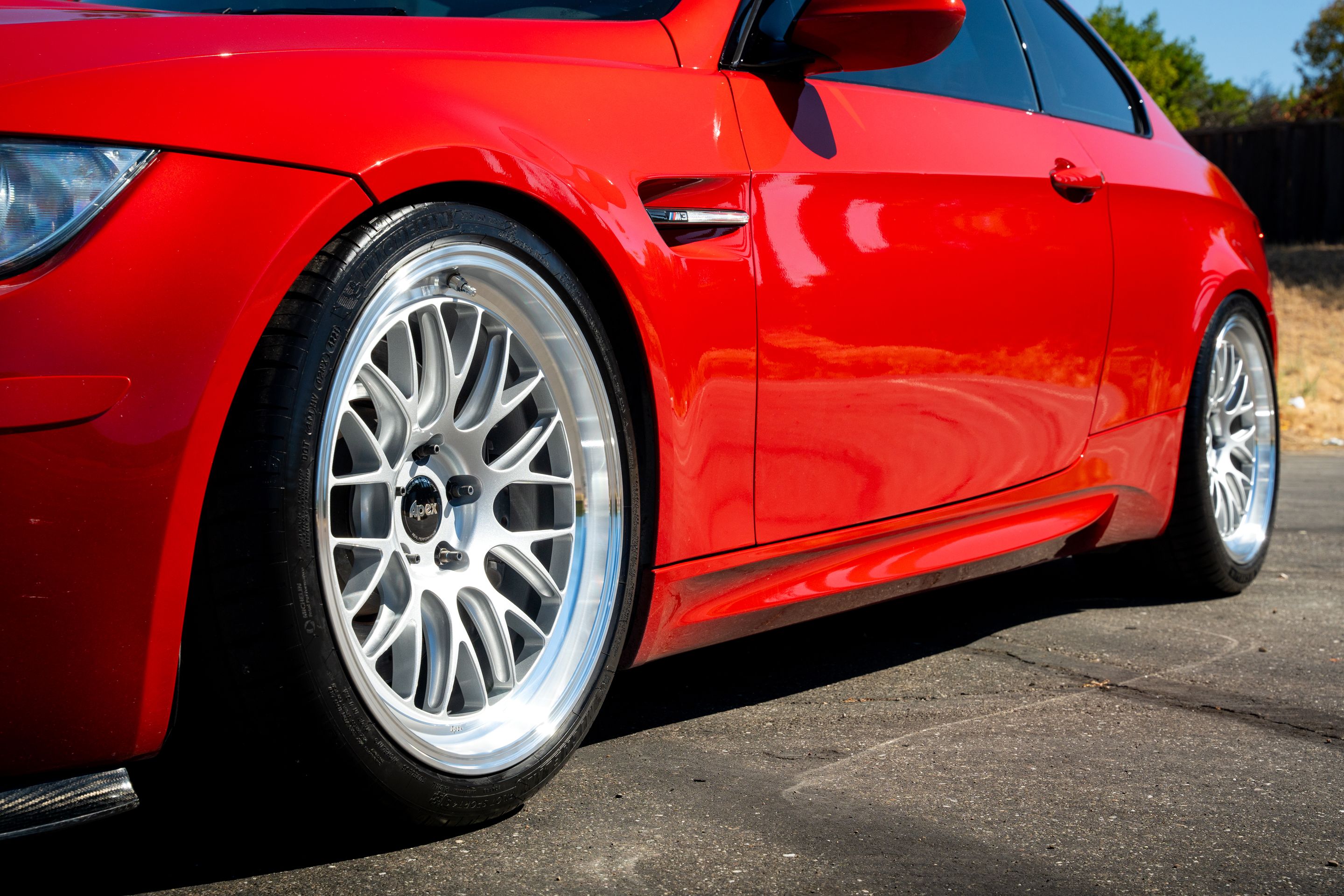 Red BMW E92 Coupe M3 with 19" ML-10RT Apex wheels in Machined Lip Race Silver