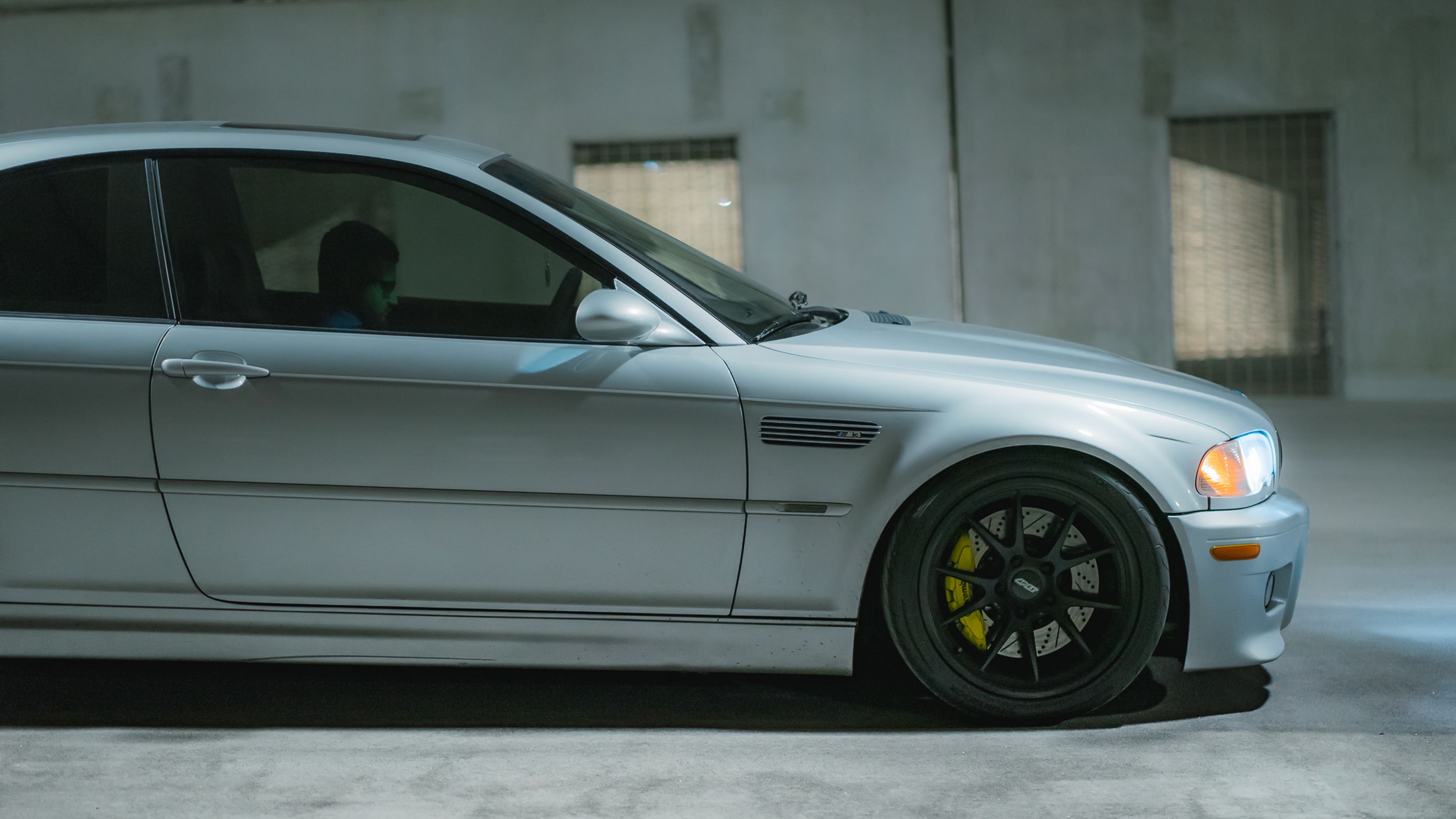 Silver BMW E46 M3 with 18" FL-5 Apex wheels in Satin Black