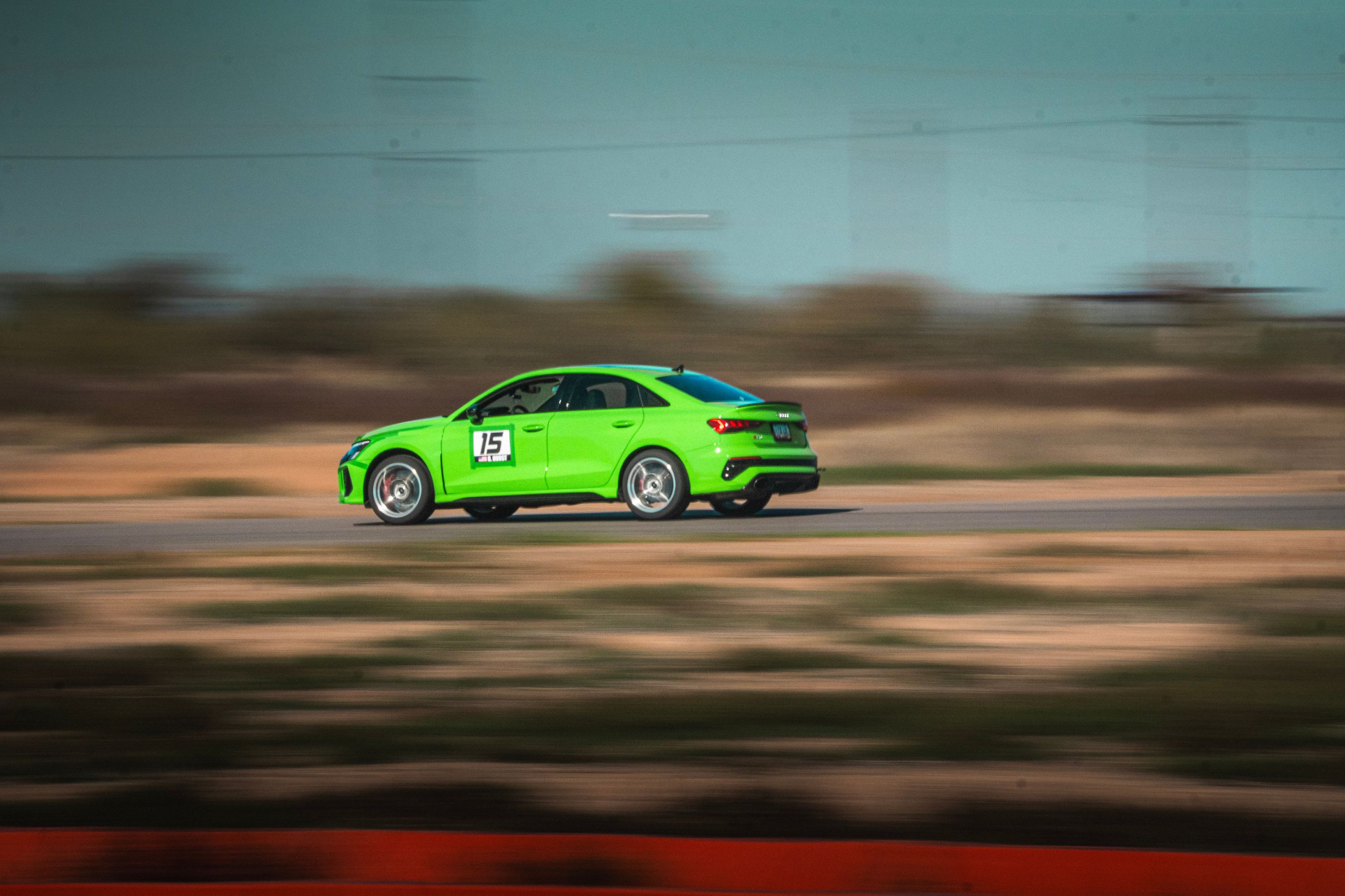 Green Audi 8Y RS 3 with 18" VS-5RS Apex wheels in Brushed Clear