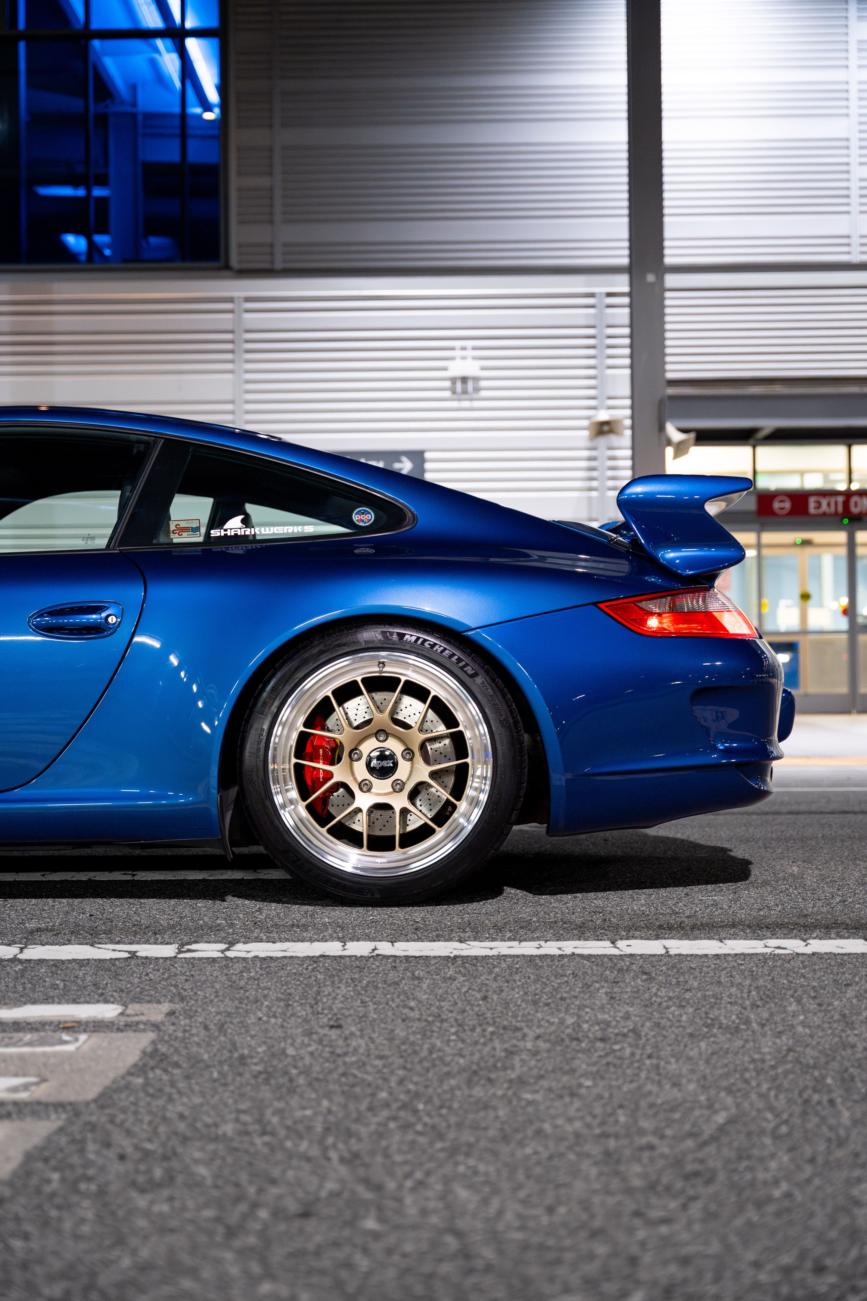 Blue Porsche 911 997 GT3 with 19" TEST-M Apex wheels in Machined Lip Gloss Motorsport Gold