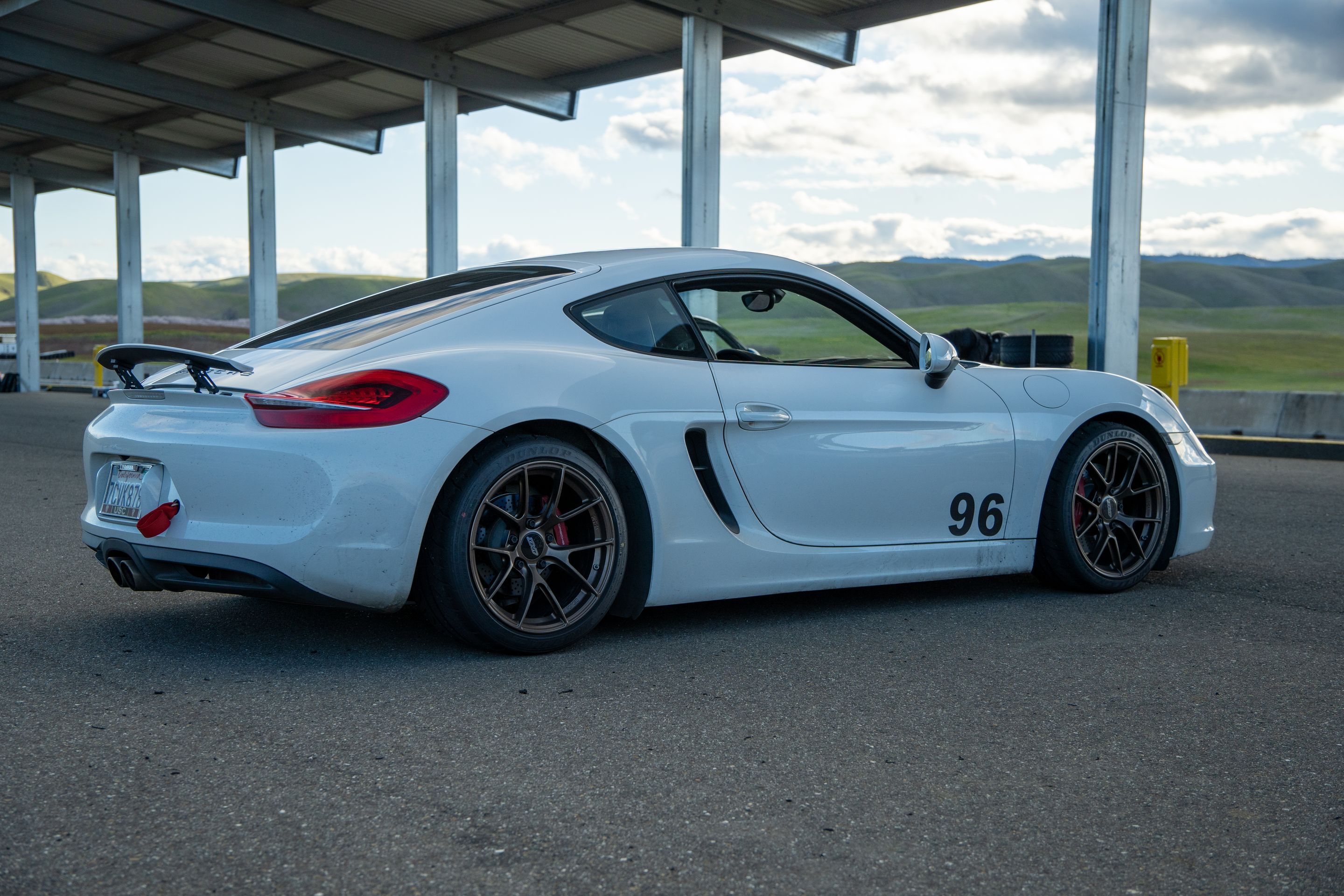 White Porsche 981 Cayman S with 18" VS-5RS Apex wheels in Satin Bronze
