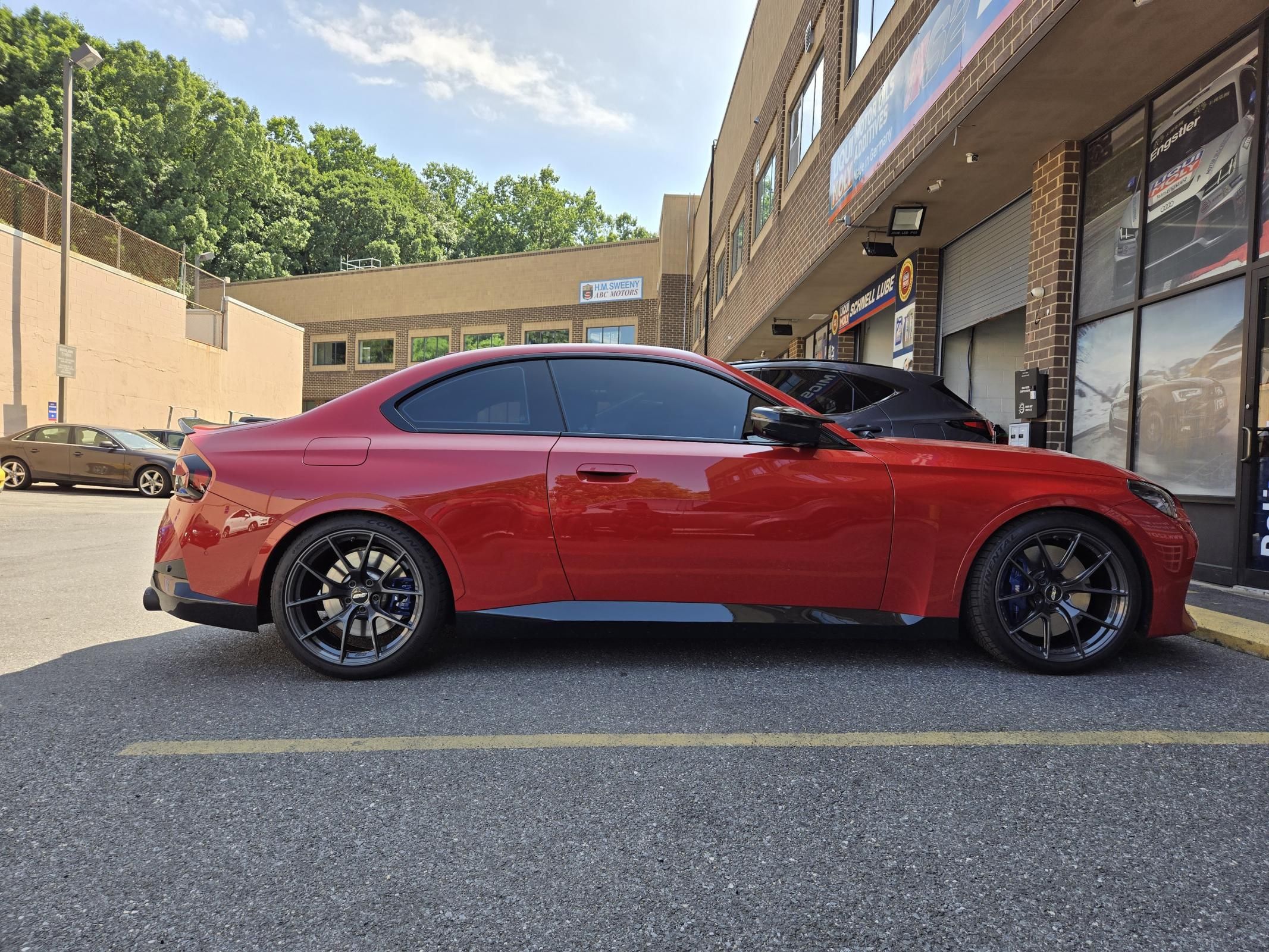 Red BMW G42 2 Series with 19" VS-5RS Apex wheels in Anthracite