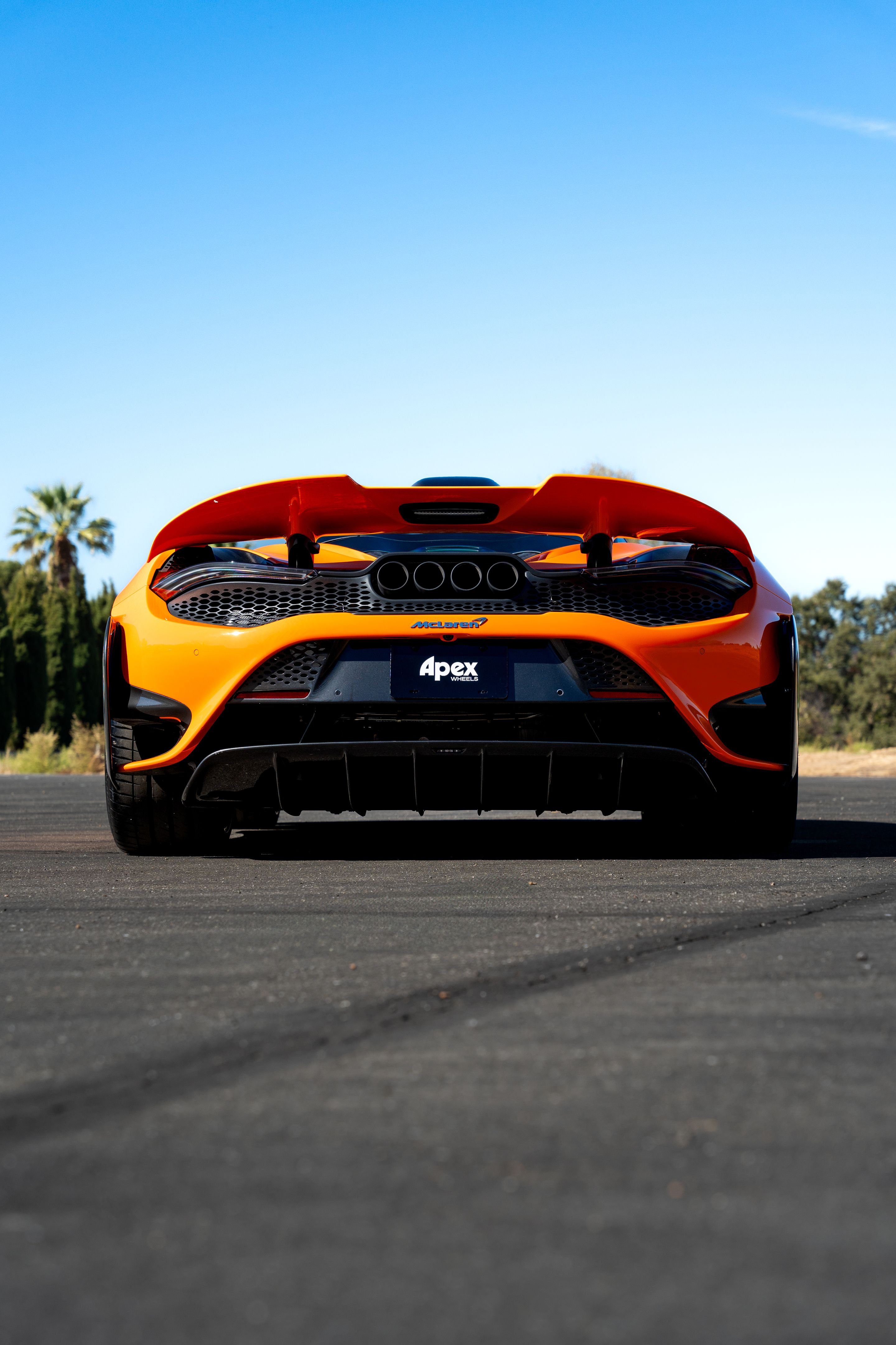 Orange McLaren 765LT with 19"/20" VS-5RS Apex wheels in Anthracite