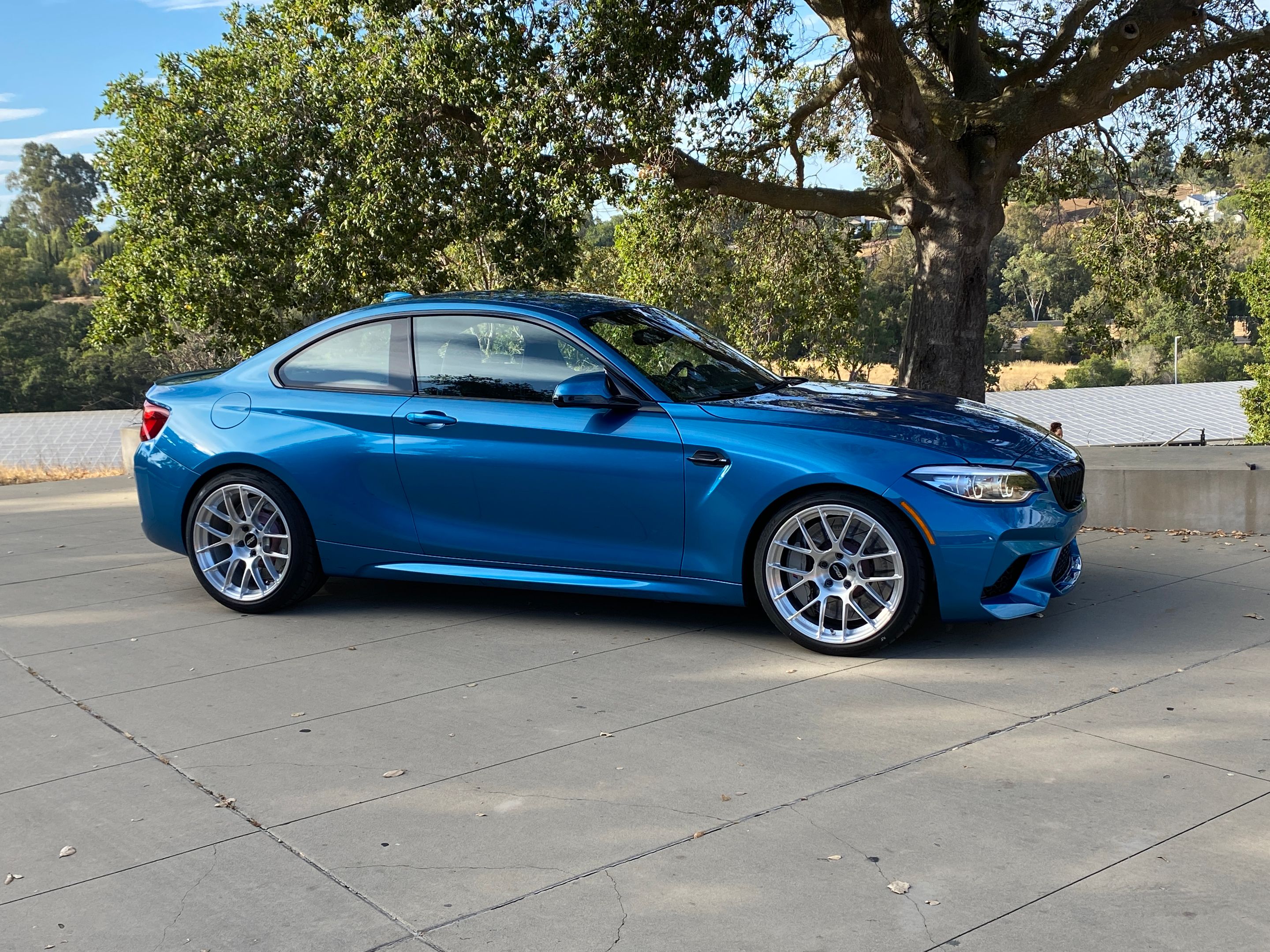 Blue BMW F87 M2 with 19" EC-7RS Apex wheels in Brushed Clear