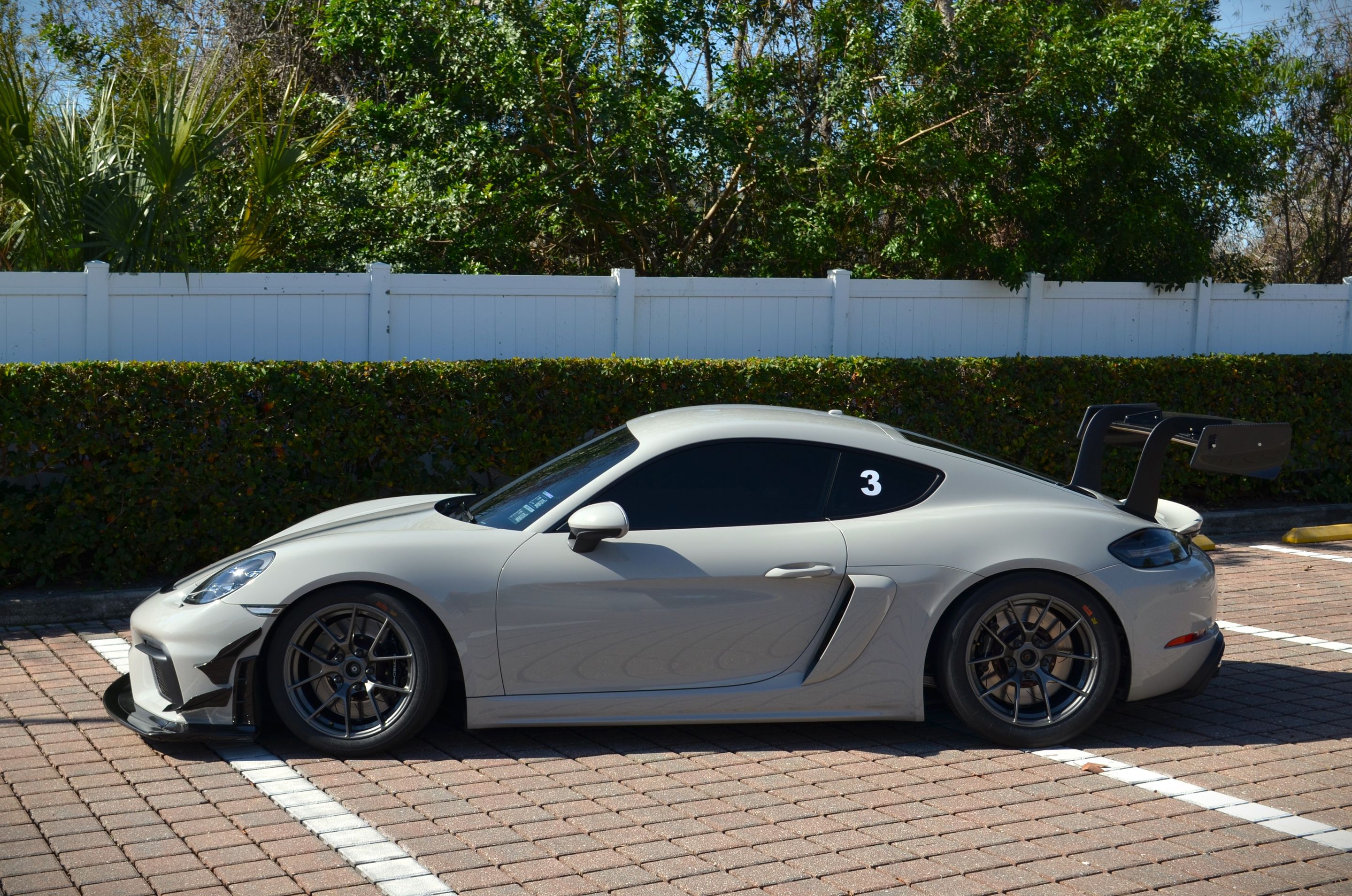 Grey Porsche 718 Cayman GT4 with 18" VS-5RS Apex wheels in Anthracite