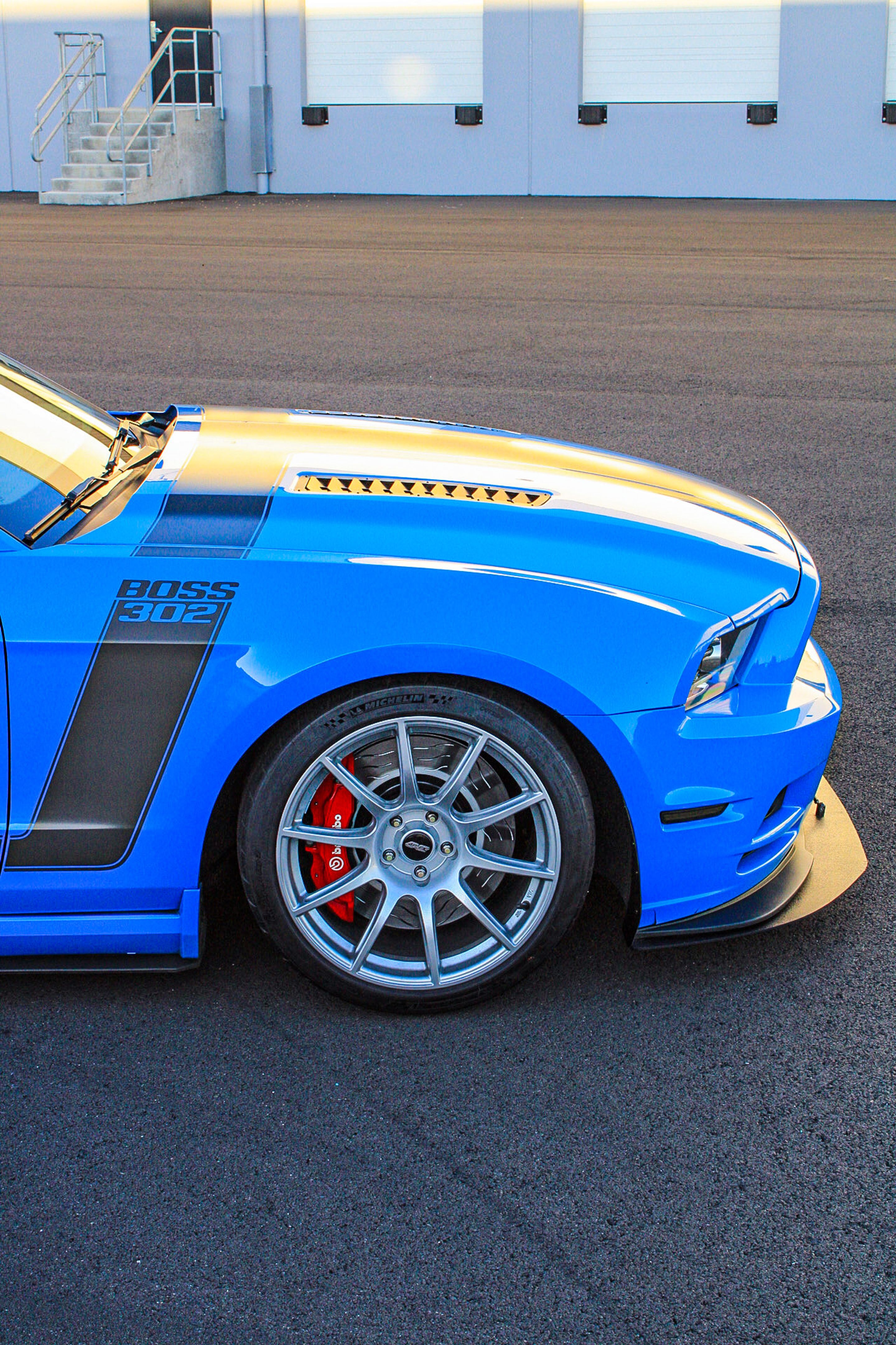 Blue Ford S197 Mustang Boss 302 with 19" SM-10 Apex wheels in Race Silver